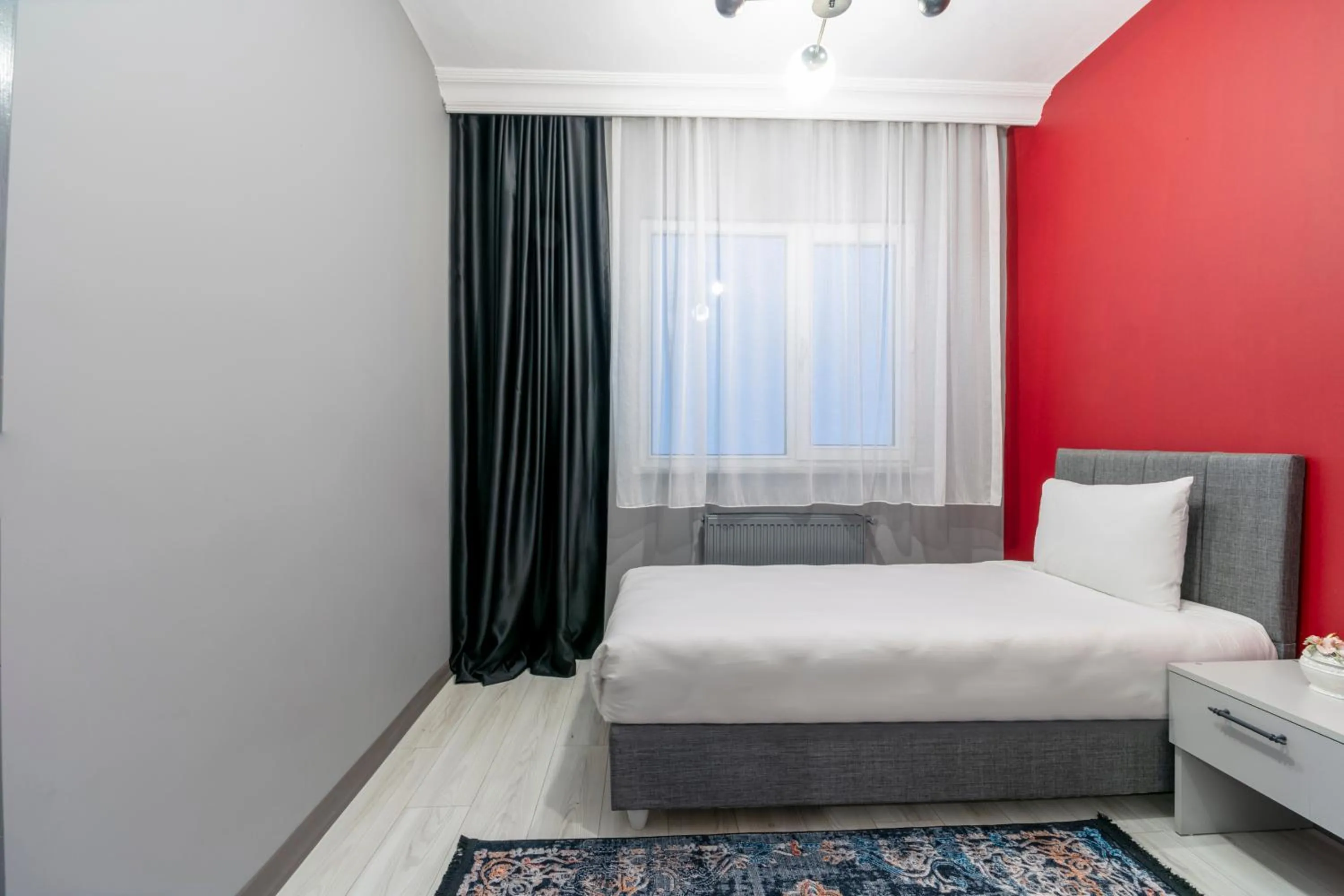 Bed in Hexa Suites Hotel