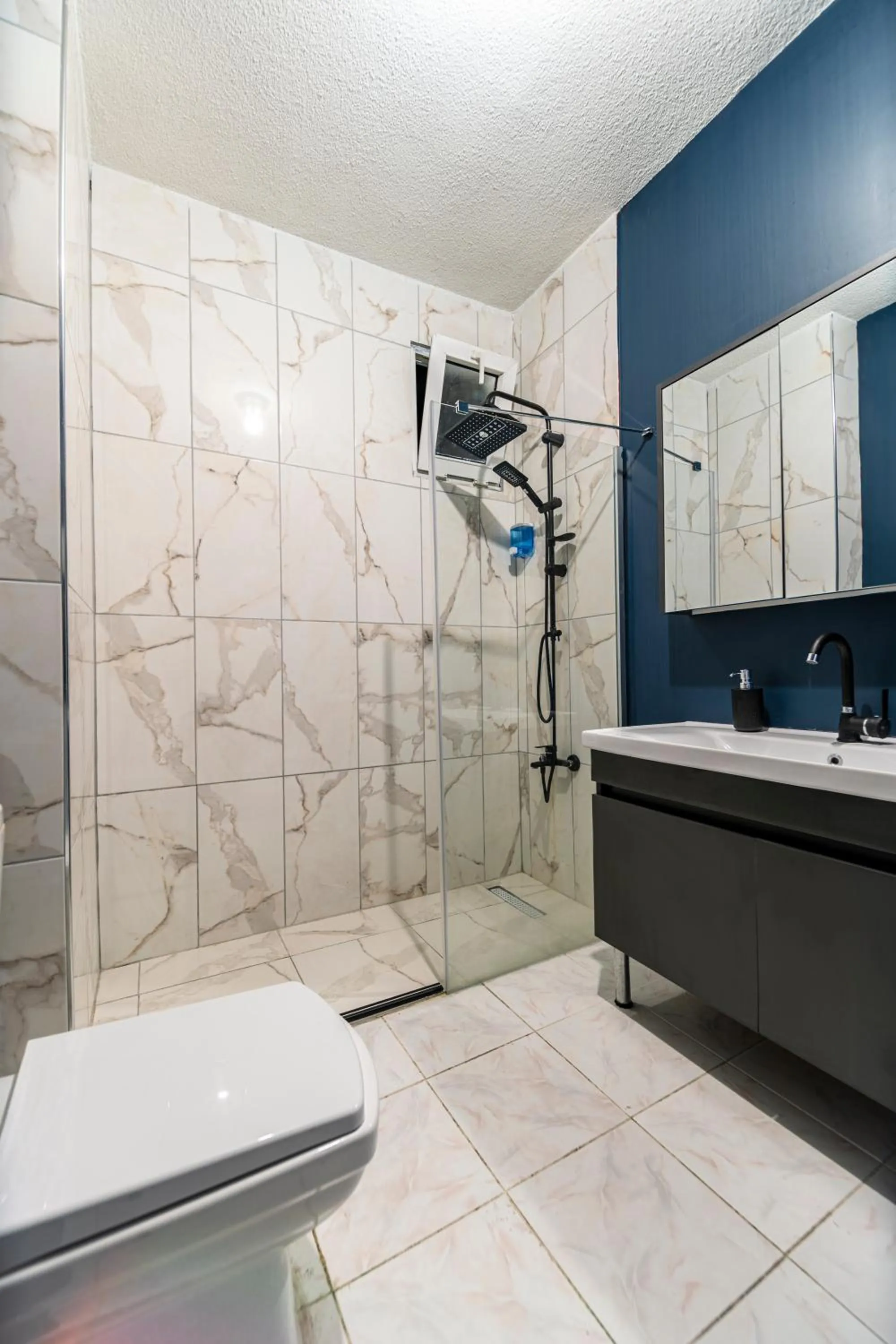 Bathroom in Hexa Suites Hotel