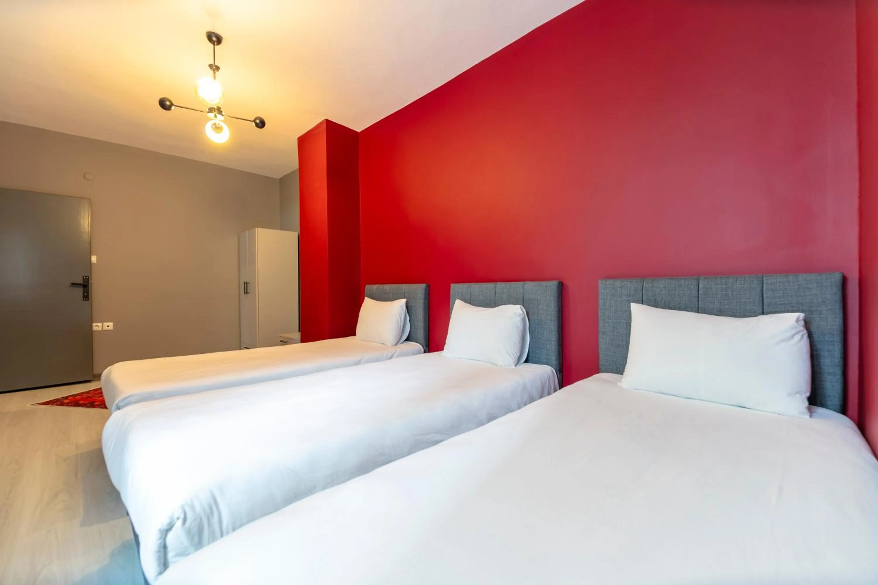 Bed in Hexa Suites Hotel