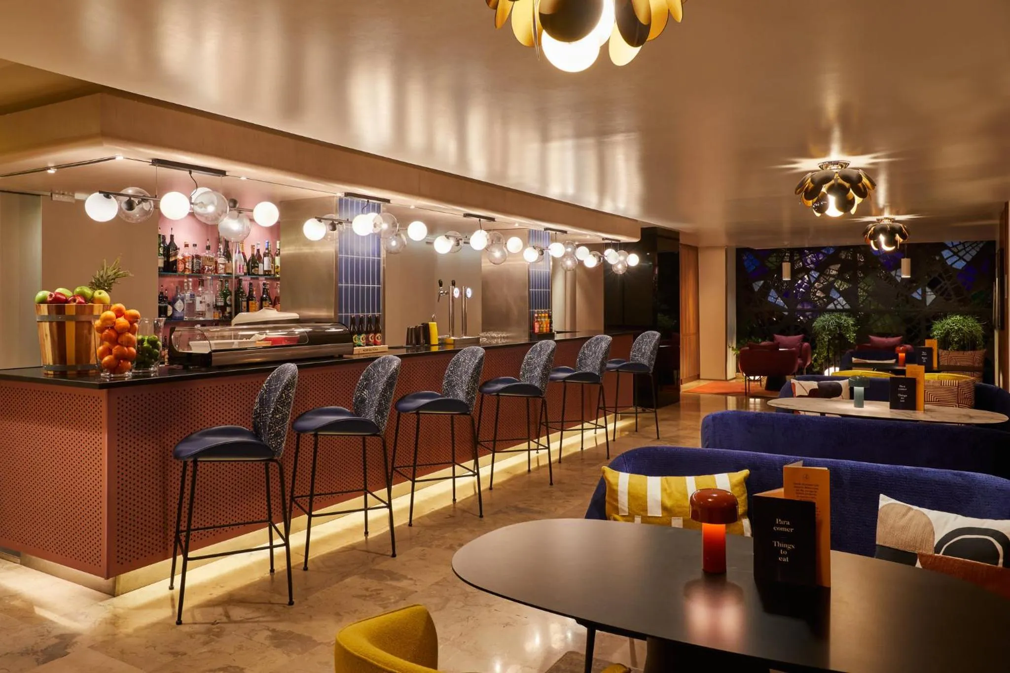 Lounge or bar in voco Madrid Retiro by IHG