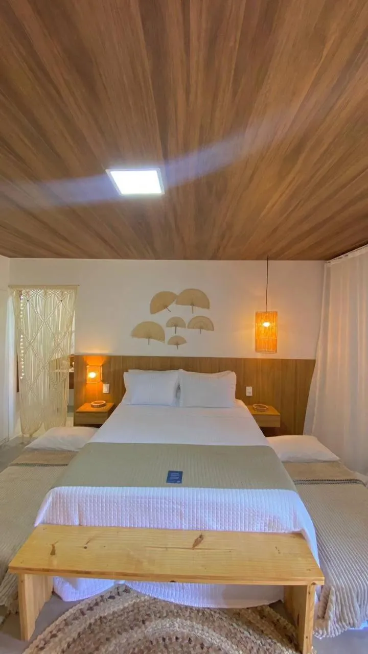 Bed in Pousada Corália