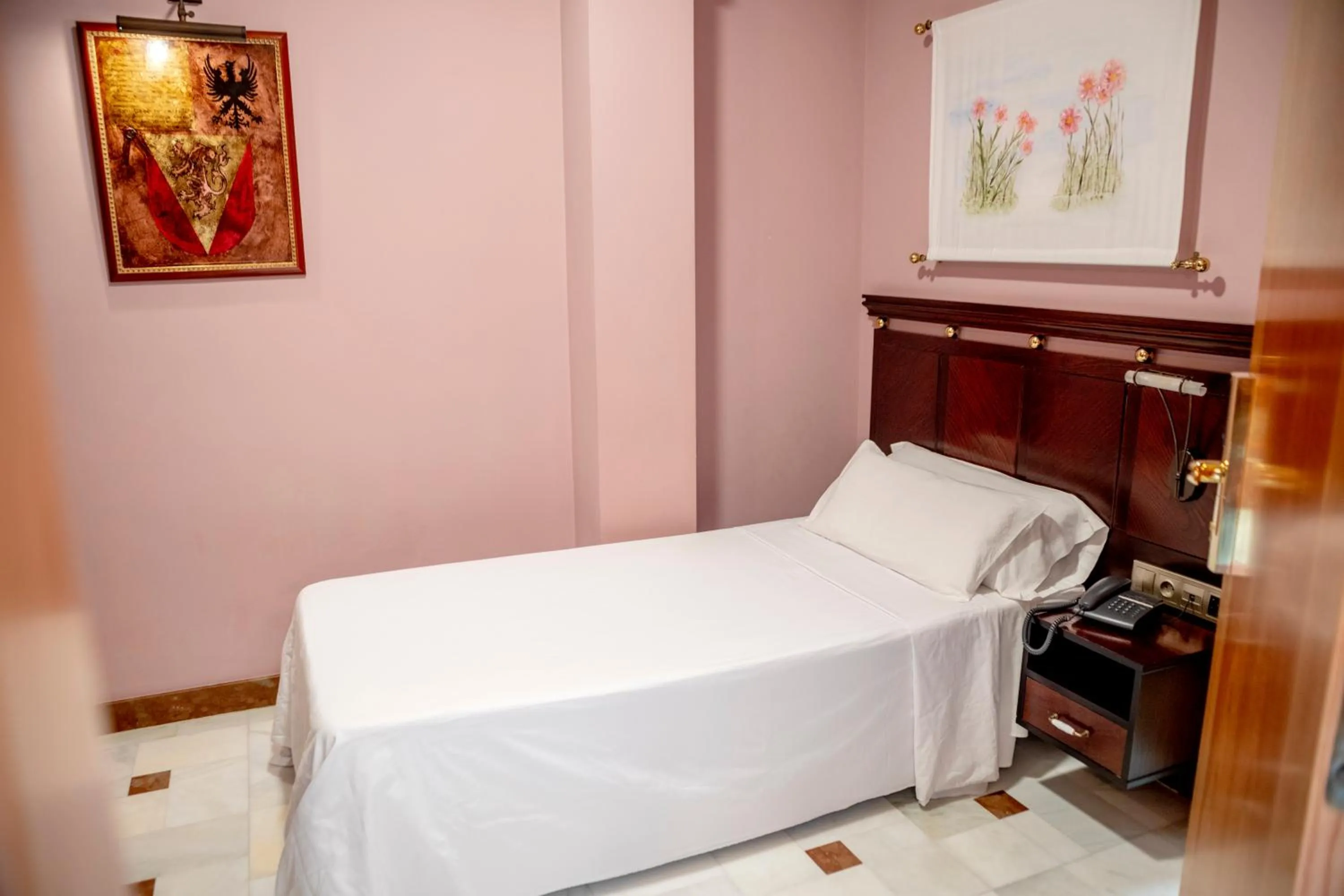 Bed in Hotel Don Miguel Plaza