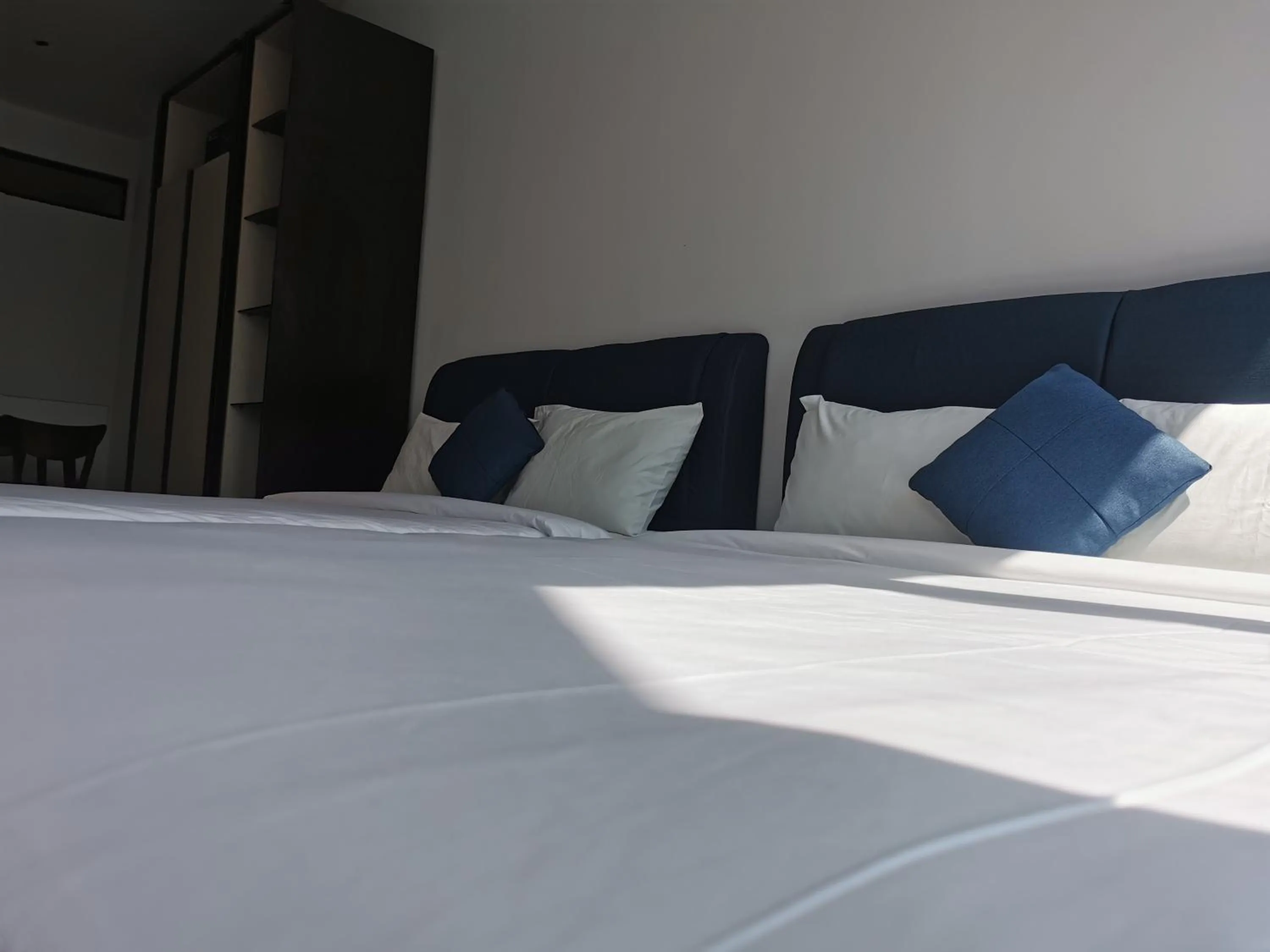 Bed in Scarletz Suites KLCC by De Harlequins Guesthouse