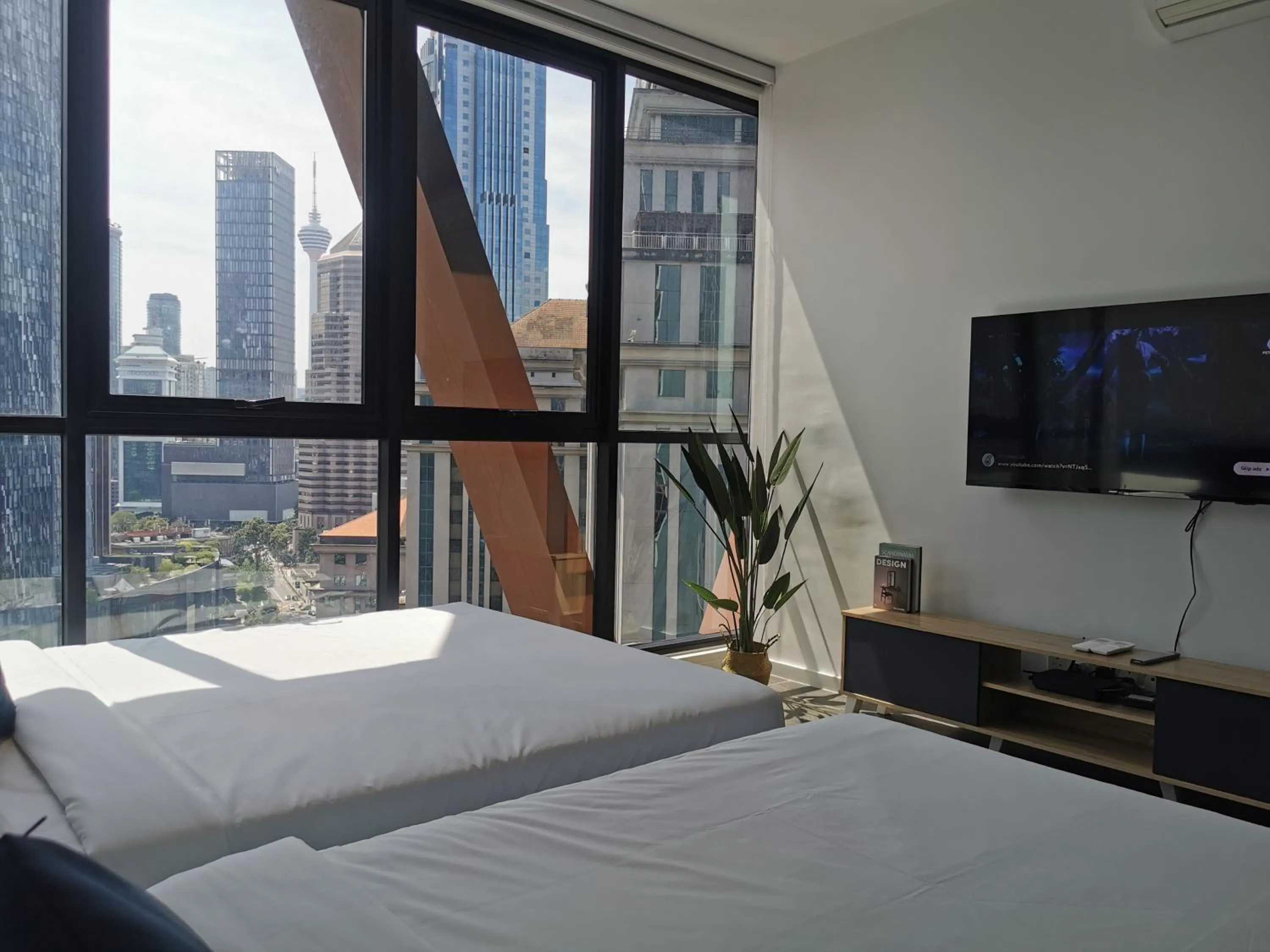 Bed in Scarletz Suites KLCC by De Harlequins Guesthouse