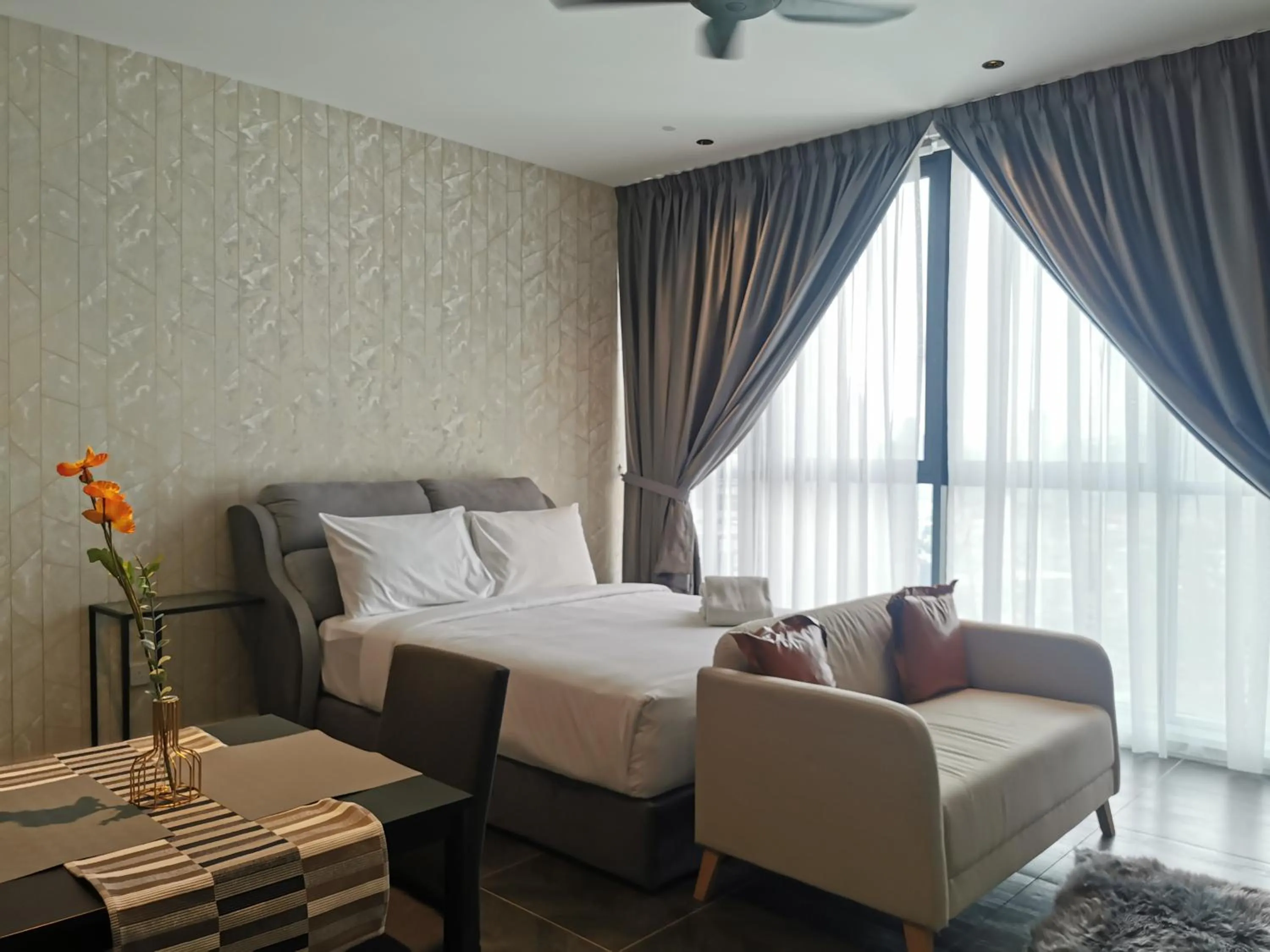 Bed in Scarletz Suites KLCC by De Harlequins Guesthouse