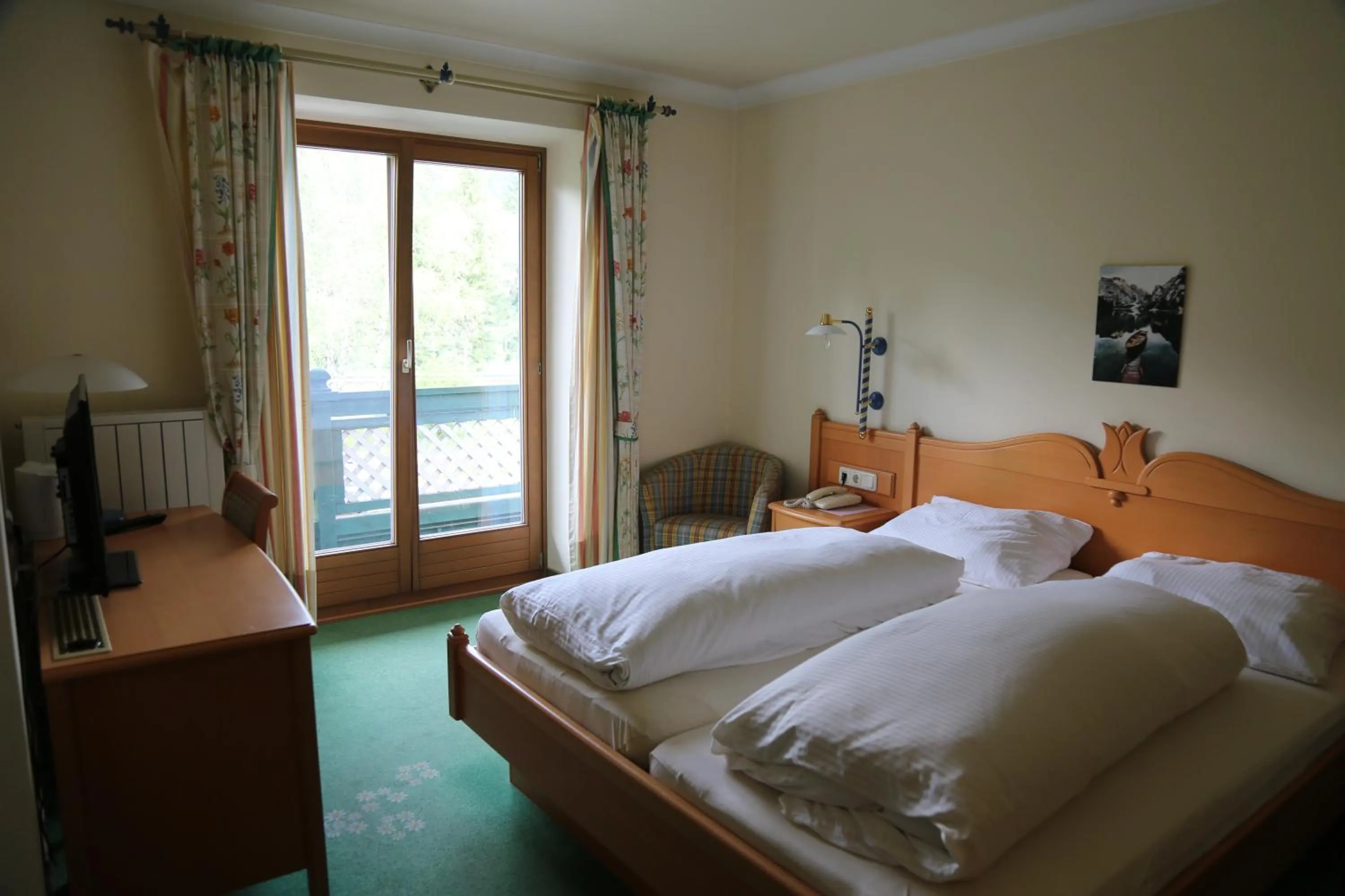 Bed in Hotel Voglauerhof