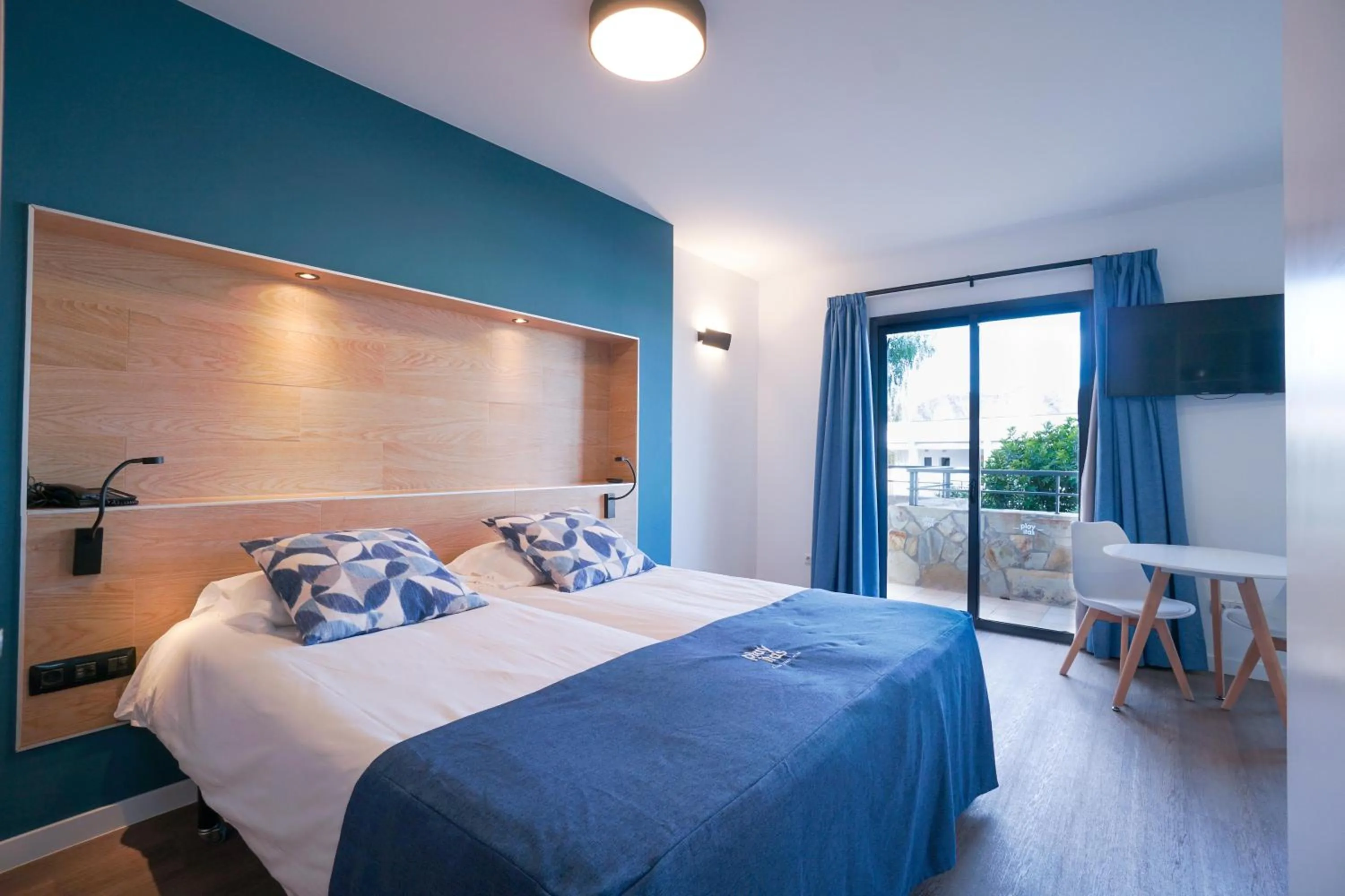 Photo of the whole room, Bed in Playitas Hotel - Sports Resort