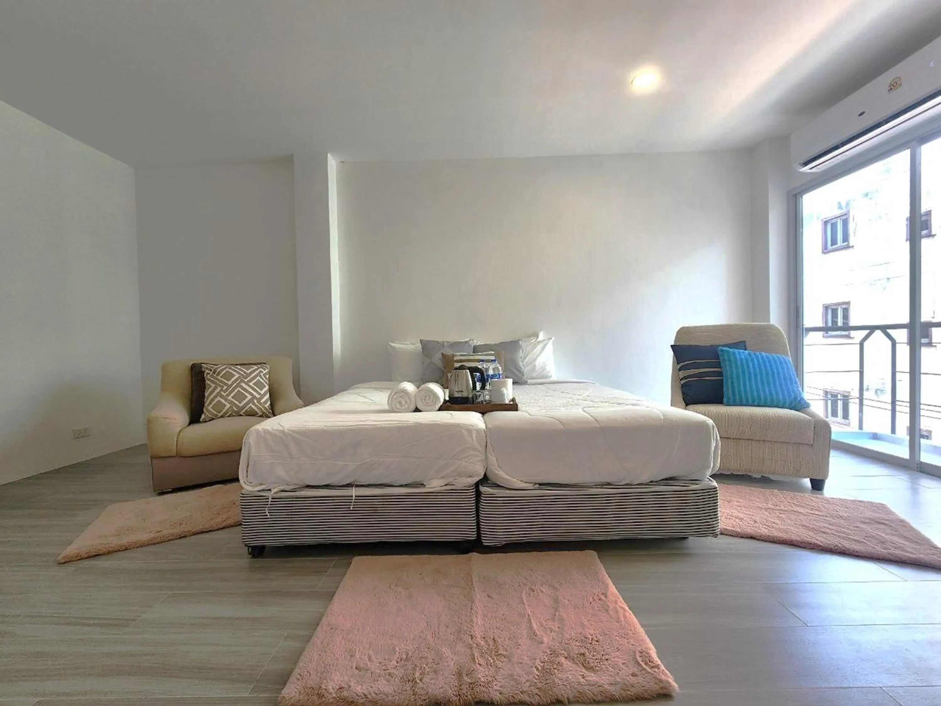 Bed in Patong Bay Inn