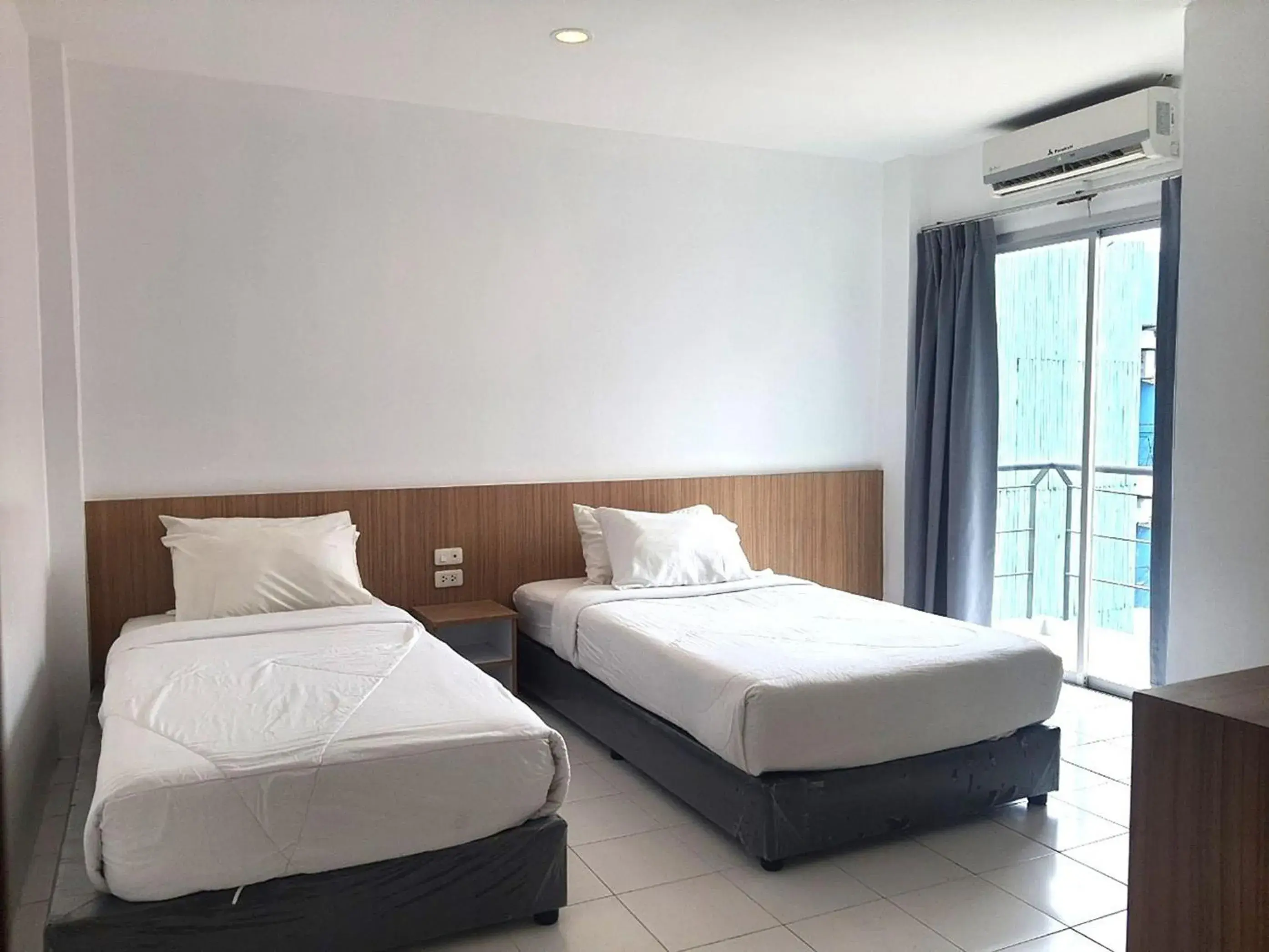 Bed in Patong Bay Inn Bed in Patong Bay Inn