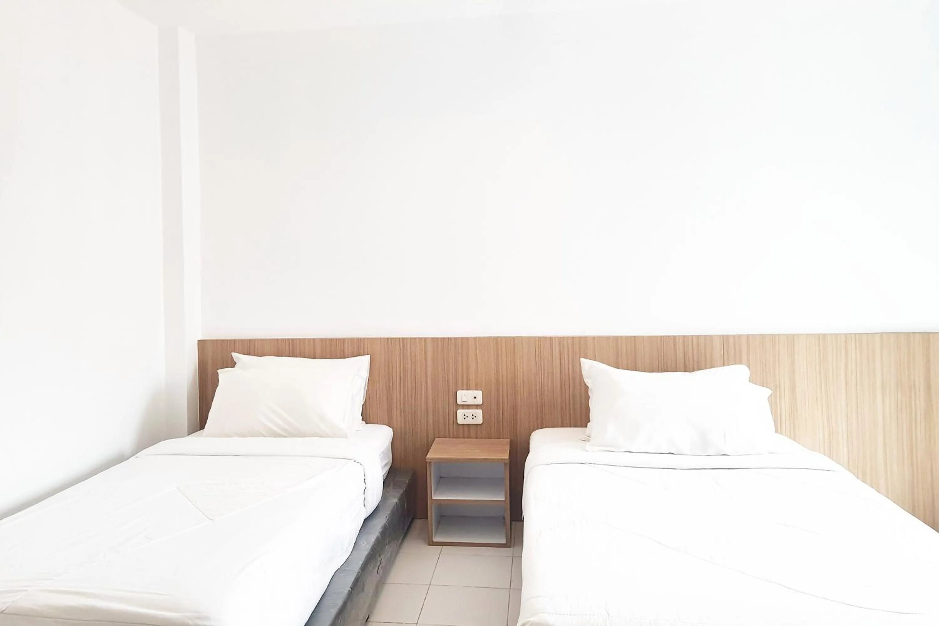 Bed in Patong Bay Inn