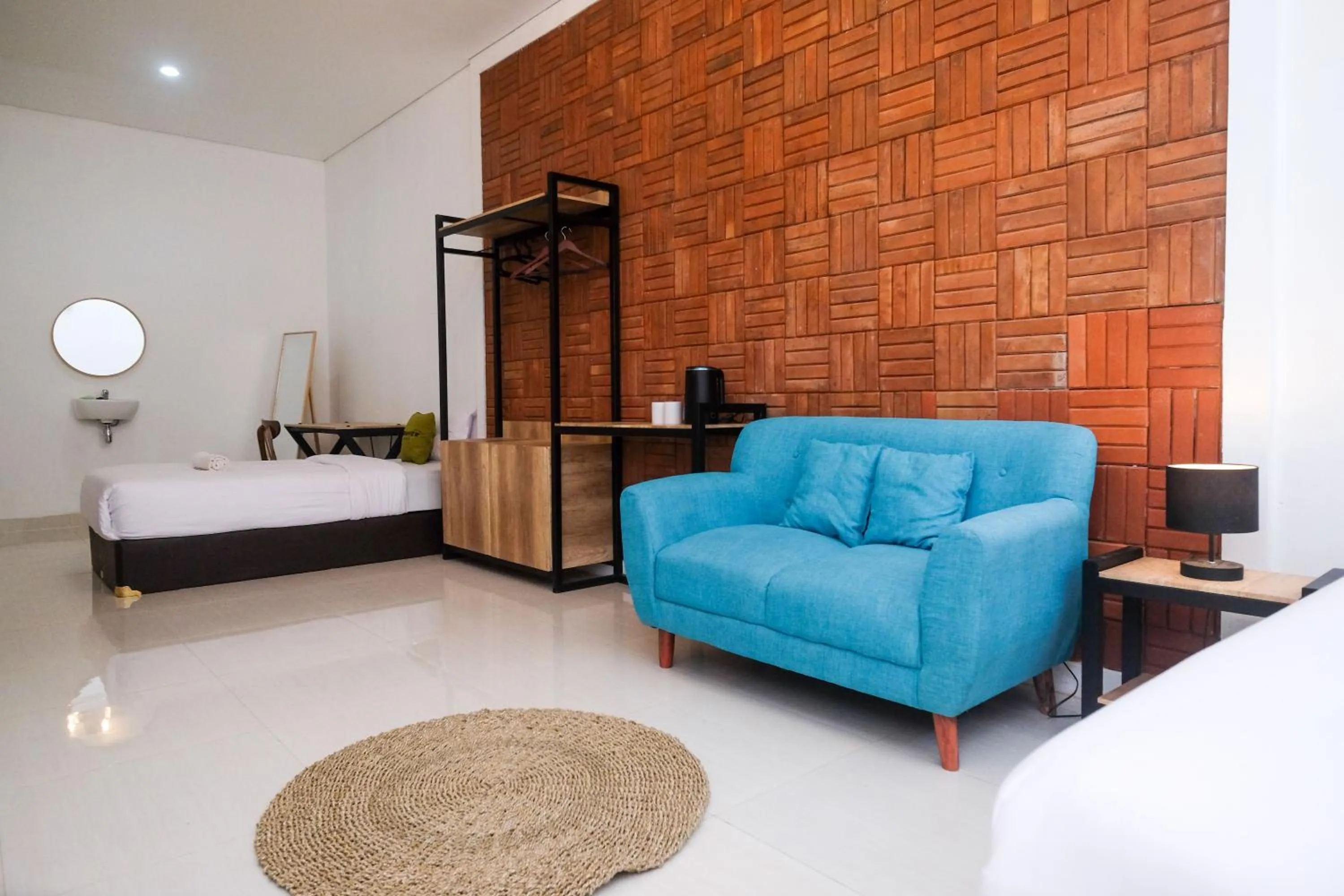 Seating area, Bed in Urbanview Griya Kusumo Seturan Yogyakarta
