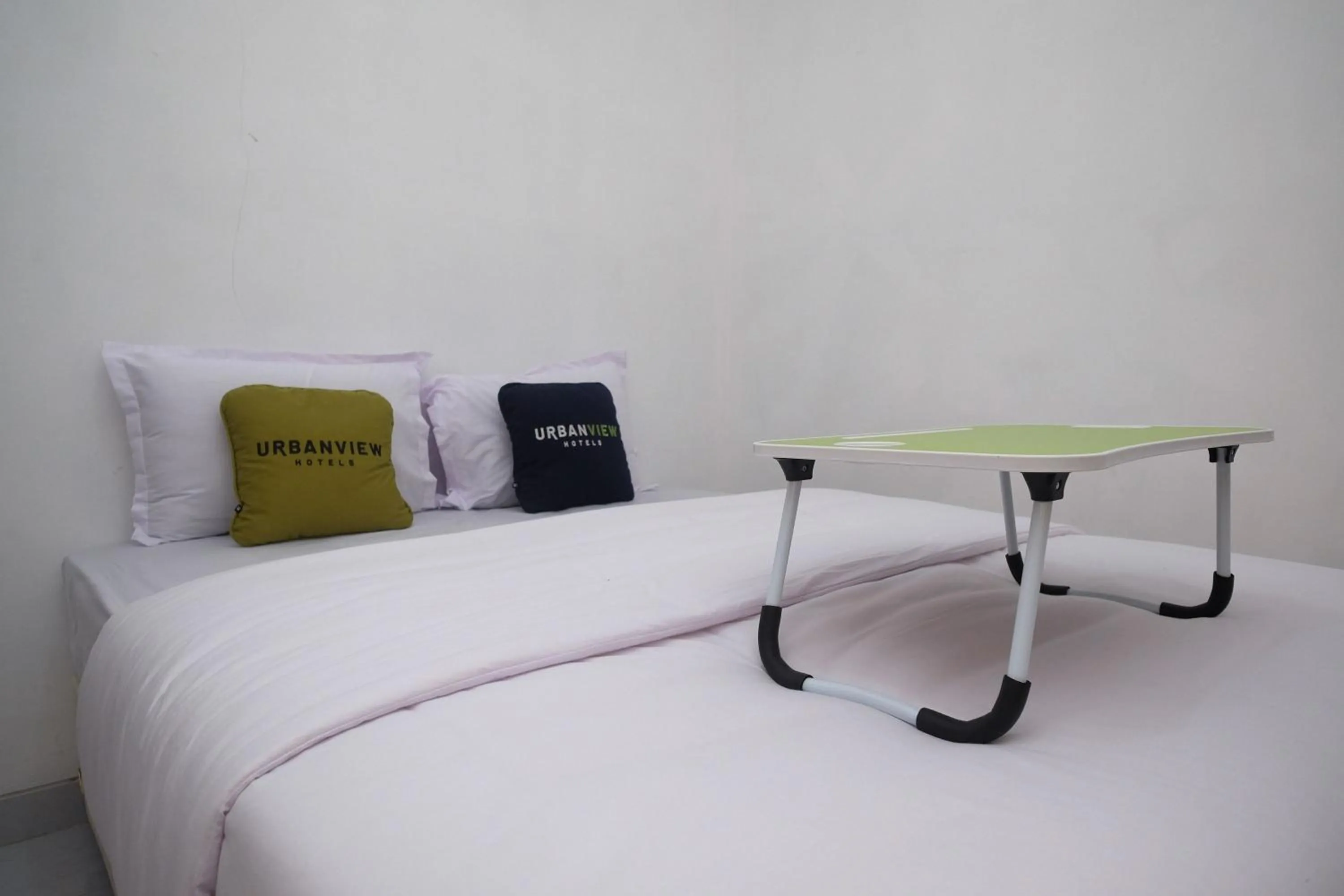Bedroom, Bed in Urbanview Griya Kusumo Seturan Yogyakarta