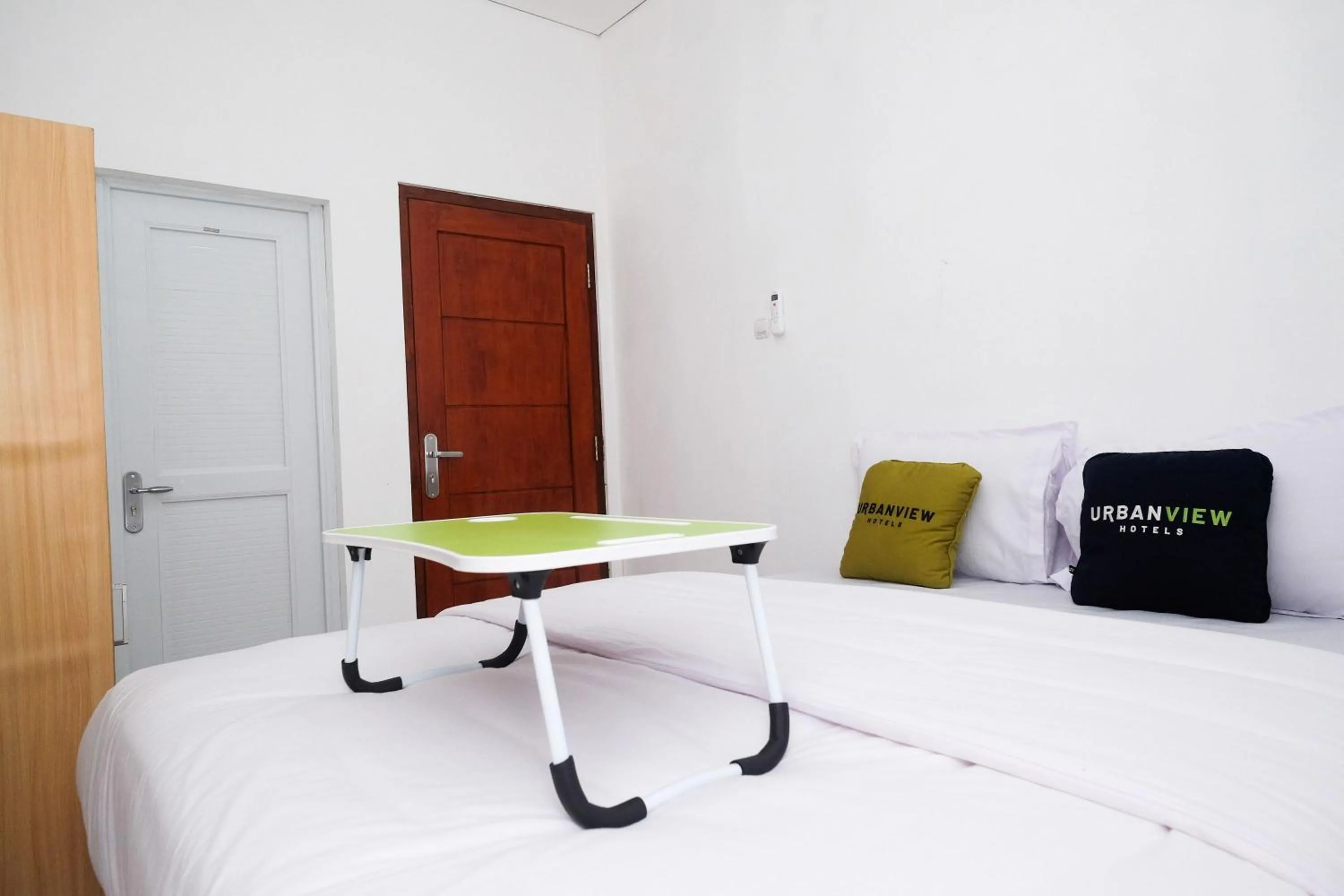 Bedroom, Bed in Urbanview Griya Kusumo Seturan Yogyakarta