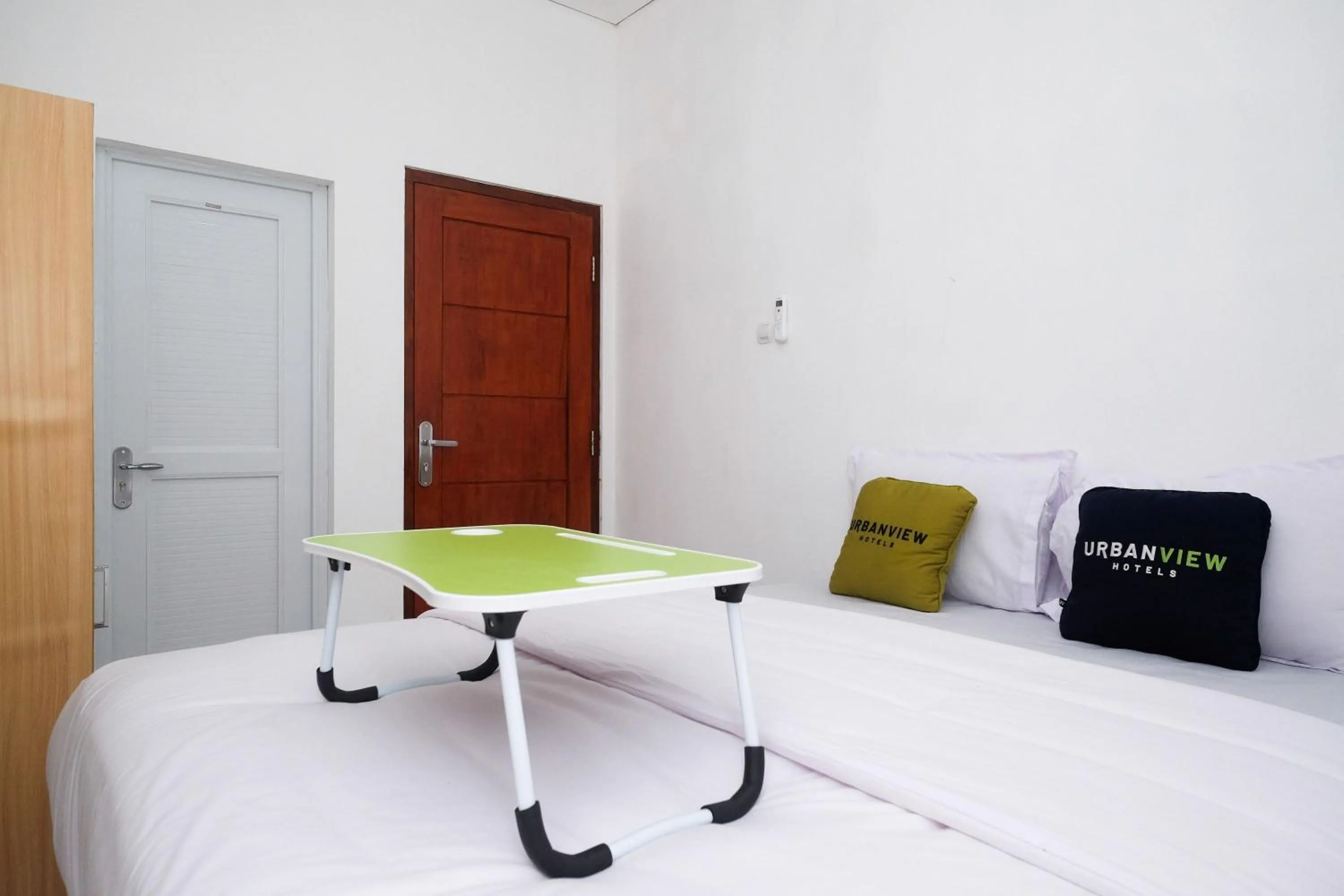 Bedroom, Bed in Urbanview Griya Kusumo Seturan Yogyakarta