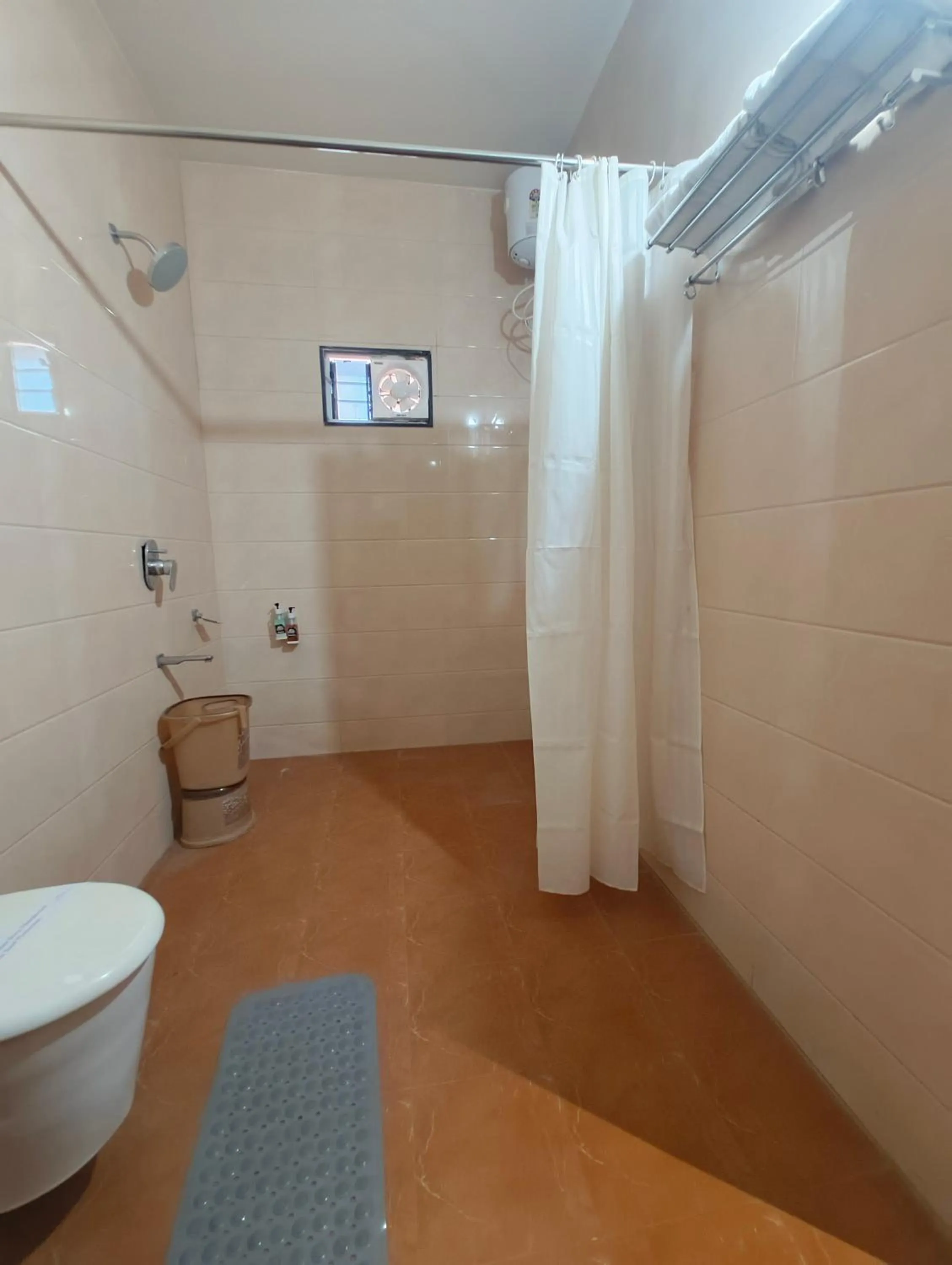 Bathroom in Flamingo Club and Resort Una 3 Km Away from Diu Check Post