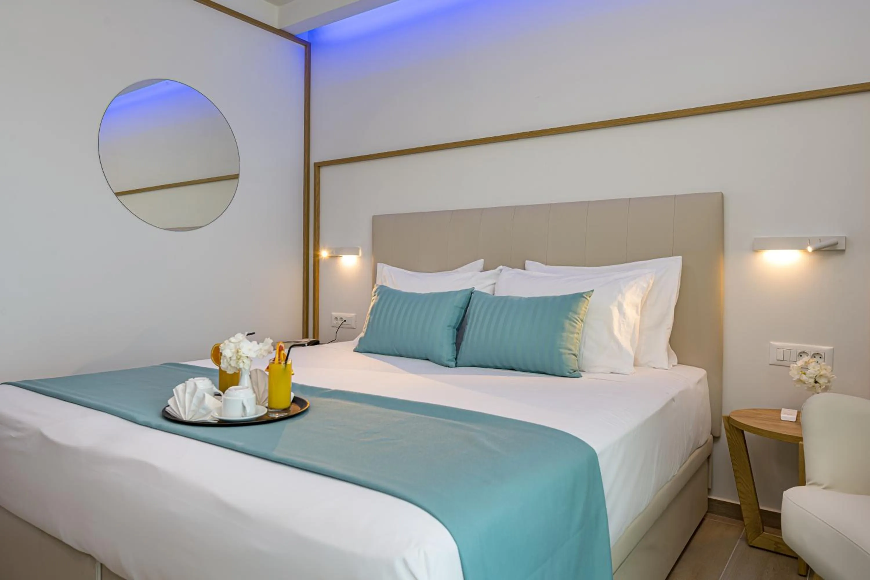 Bed in Mirage Bleu Hotel