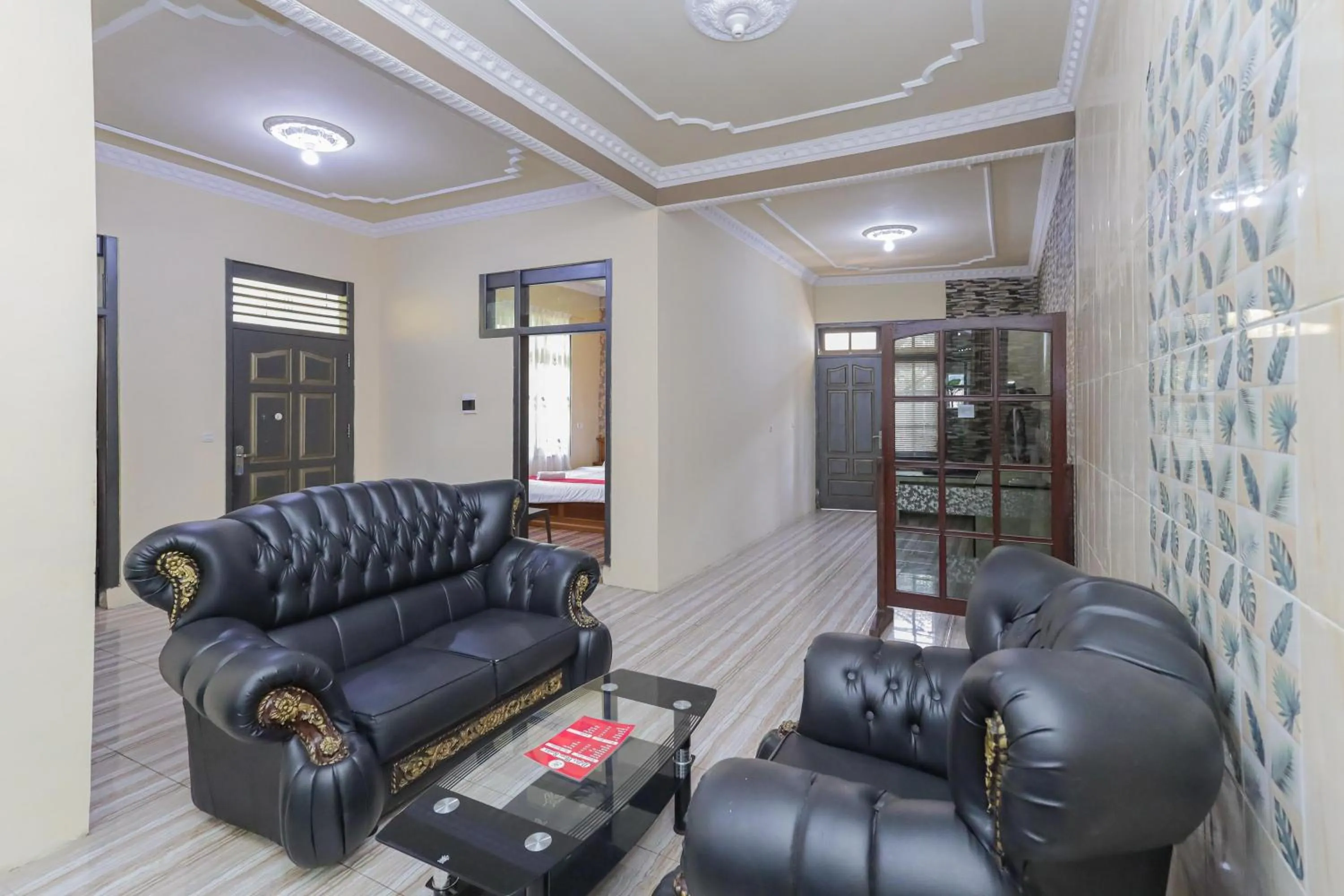 Living room in RedDoorz Plus @ Villa Bontes Batu