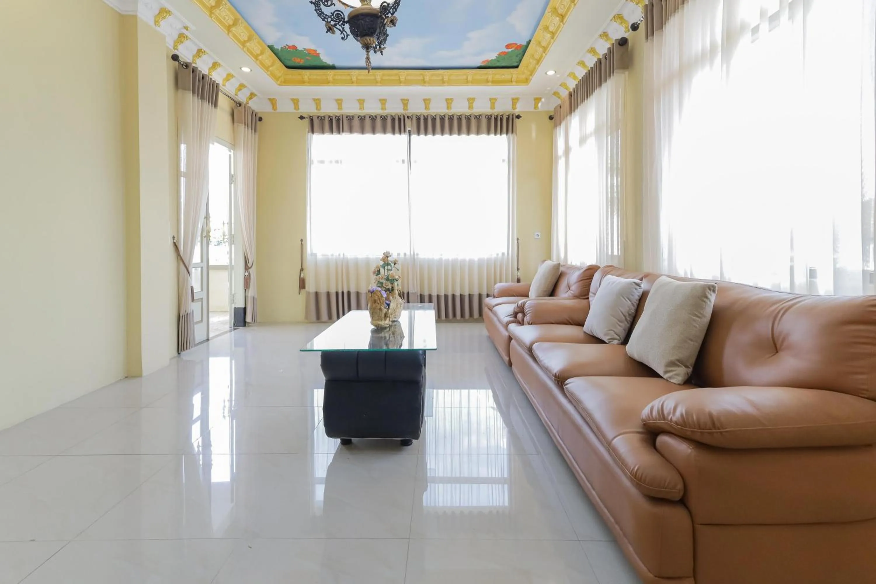 Living room in RedDoorz Plus @ Villa Bontes Batu