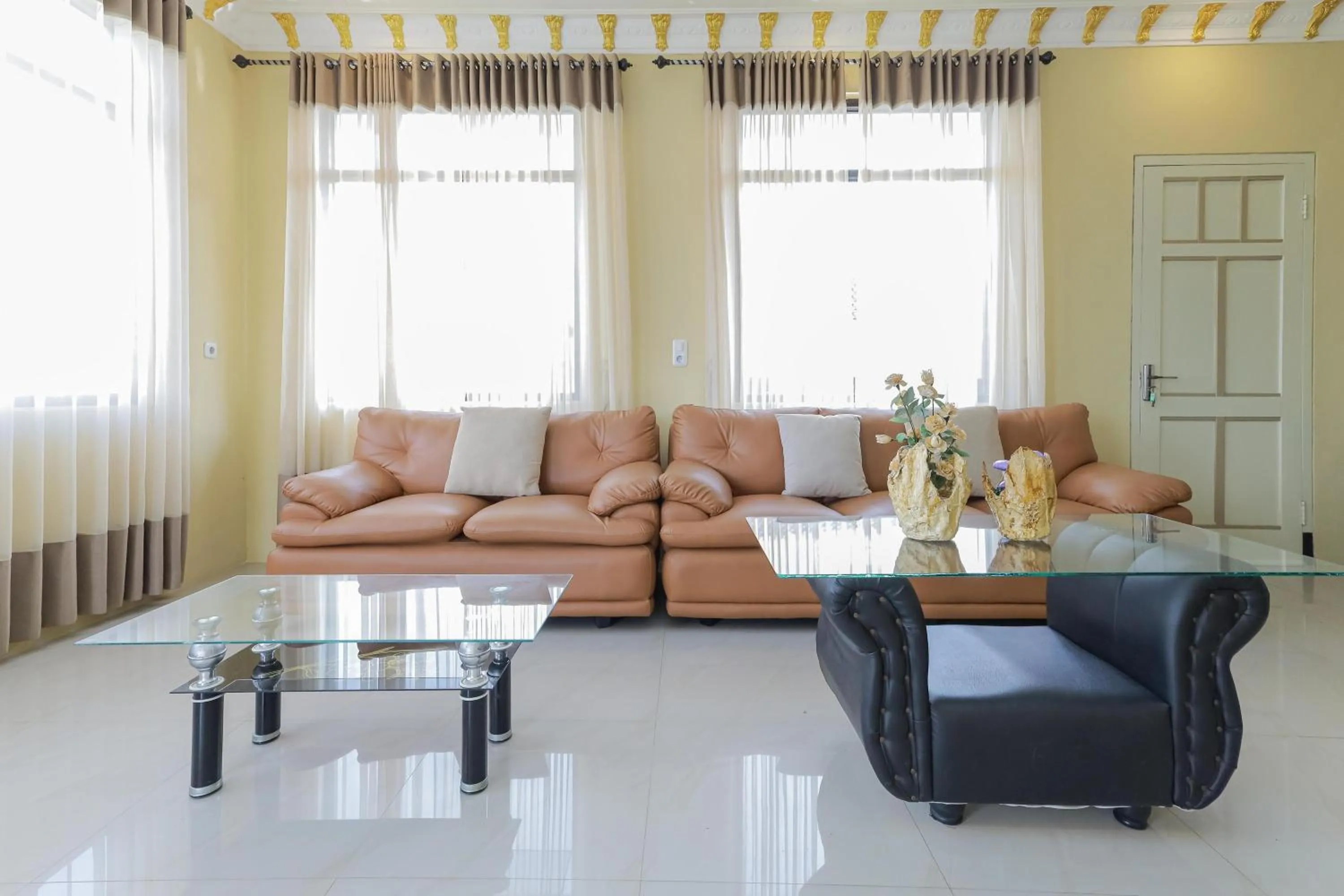 Living room in RedDoorz Plus @ Villa Bontes Batu