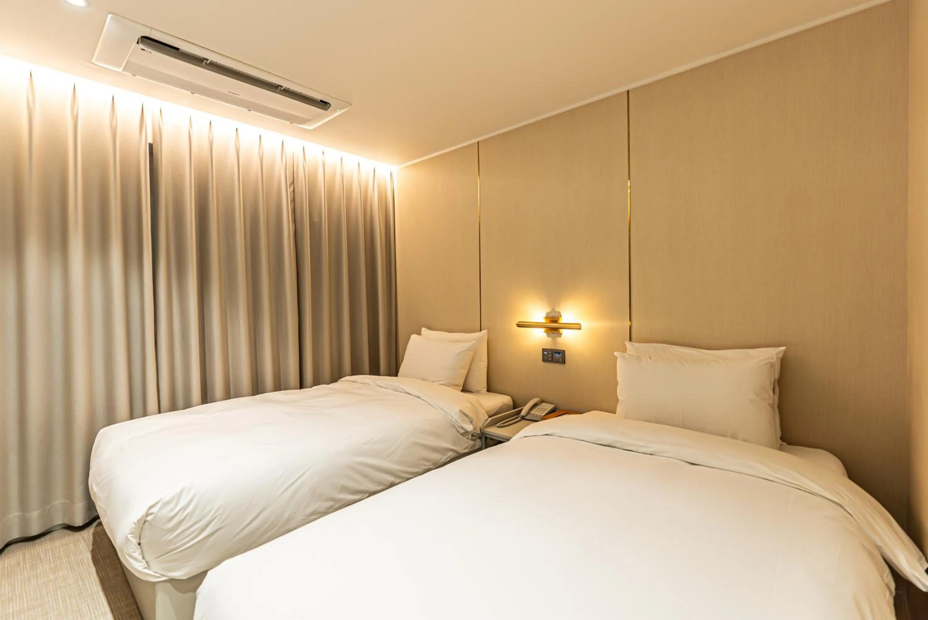 Bed in Hotel The Grang Seogwipo