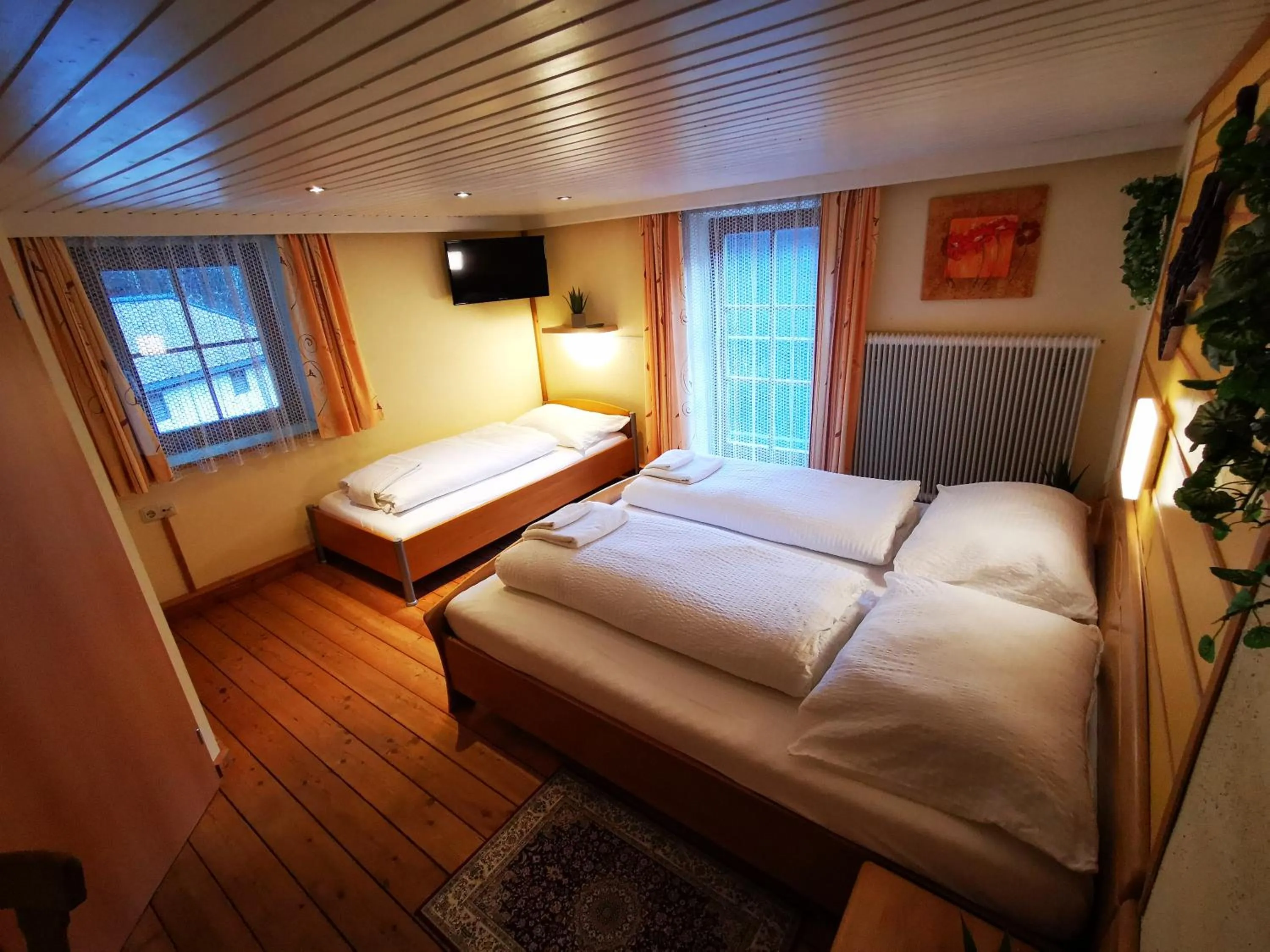 Photo of the whole room, Bed in Gasthof Geronimo