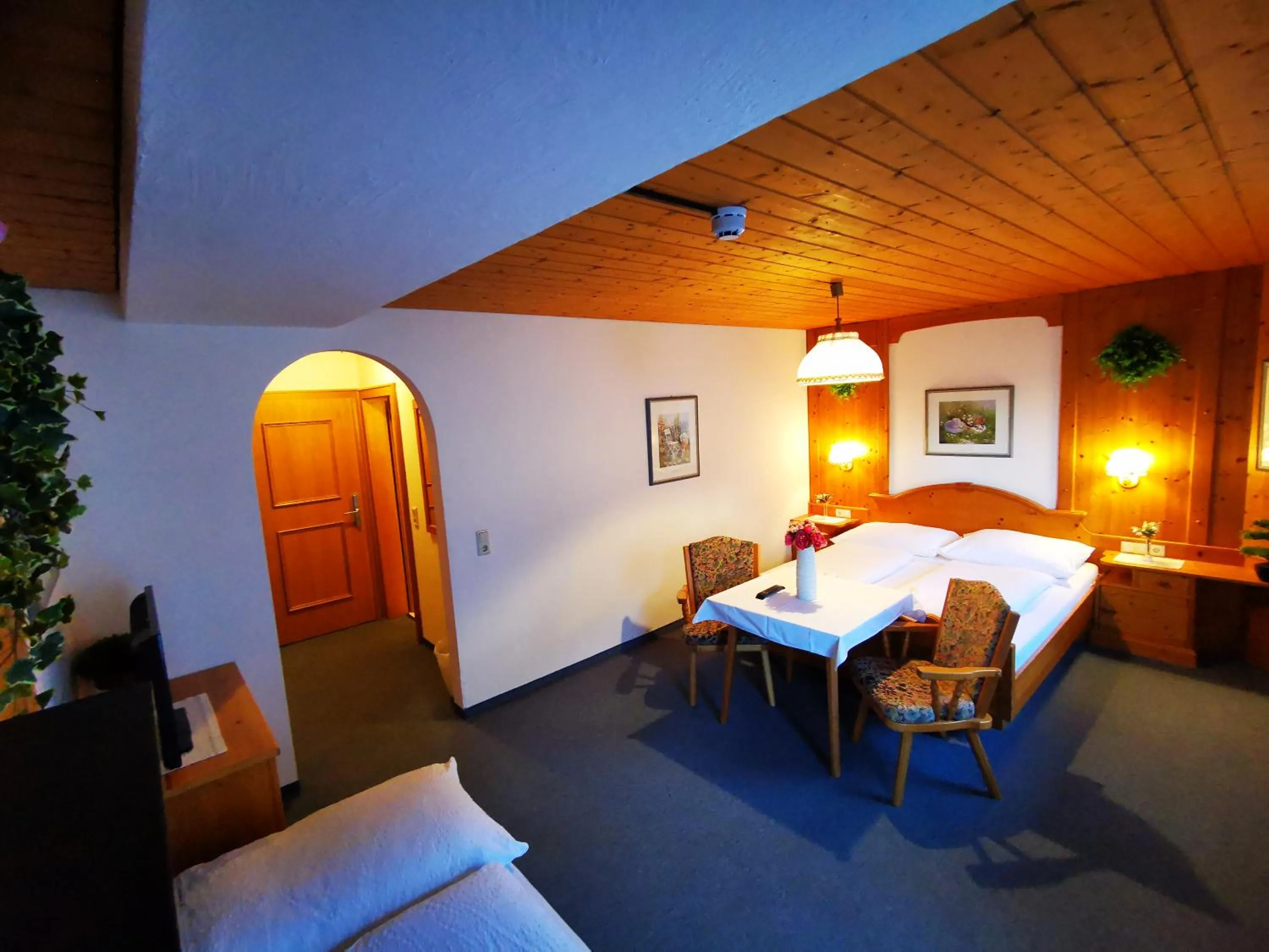 Photo of the whole room, Bed in Gasthof Geronimo