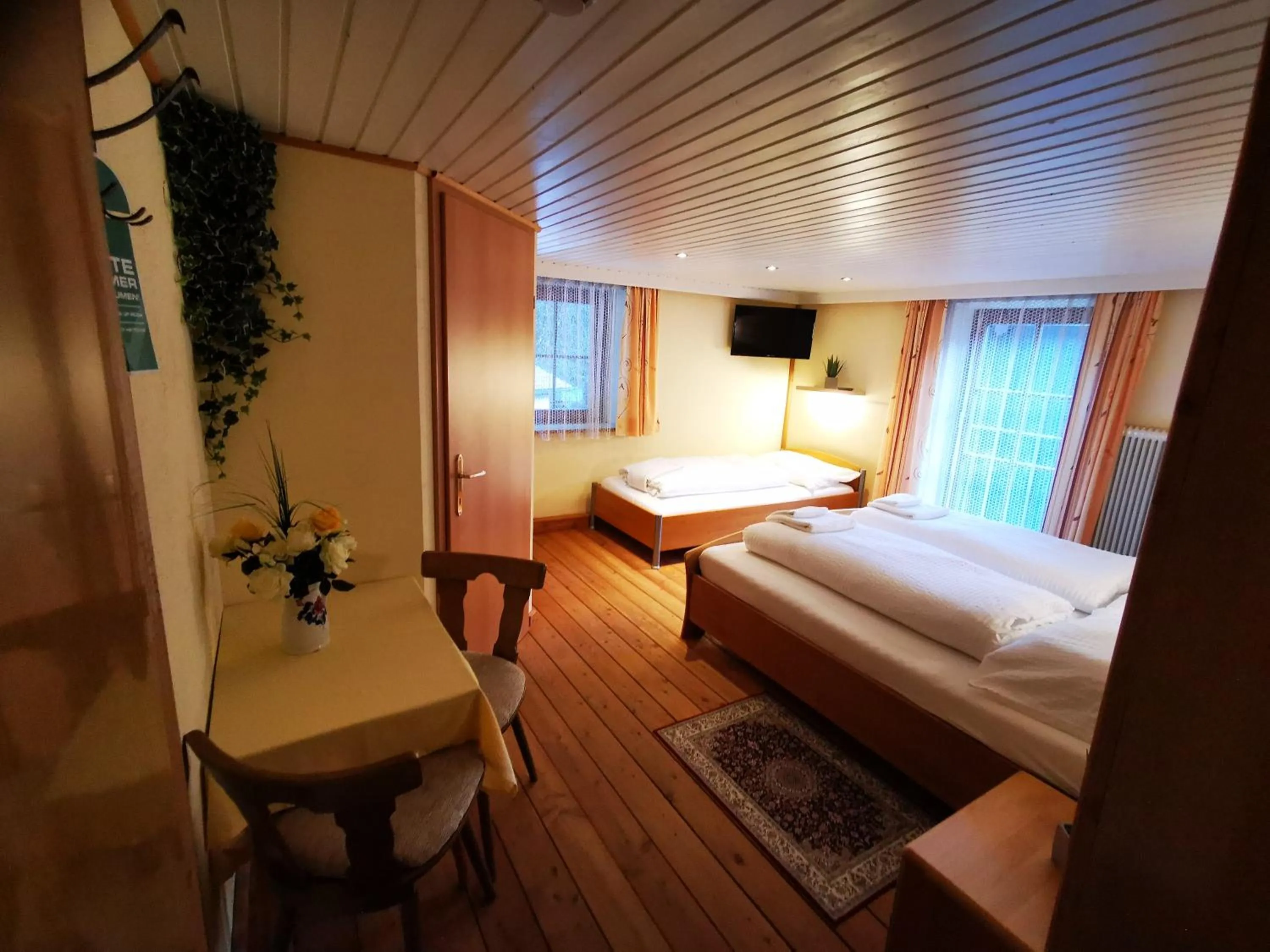 Photo of the whole room, Bed in Gasthof Geronimo