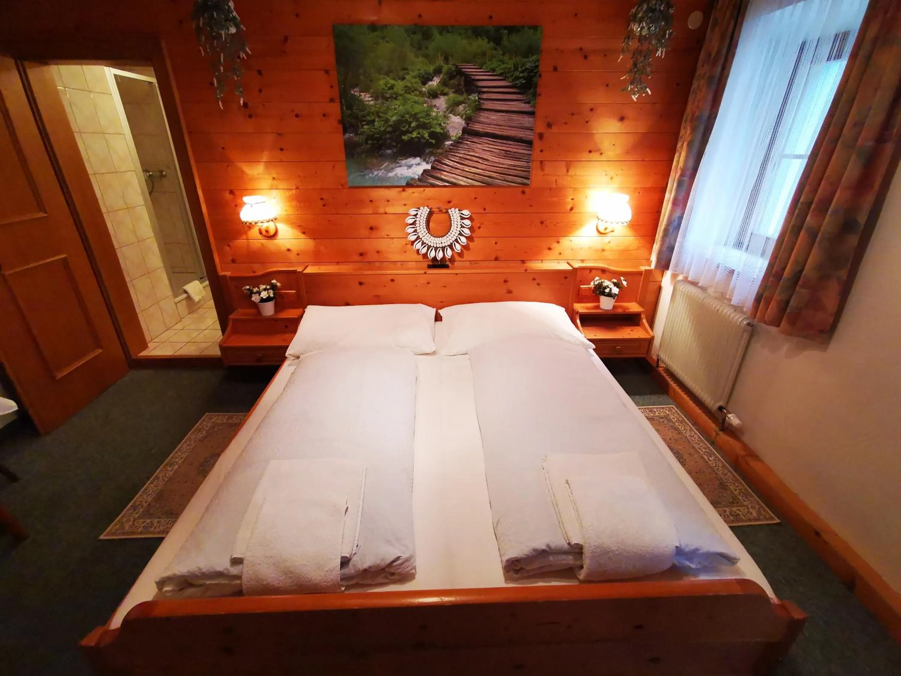 Bed in Gasthof Geronimo