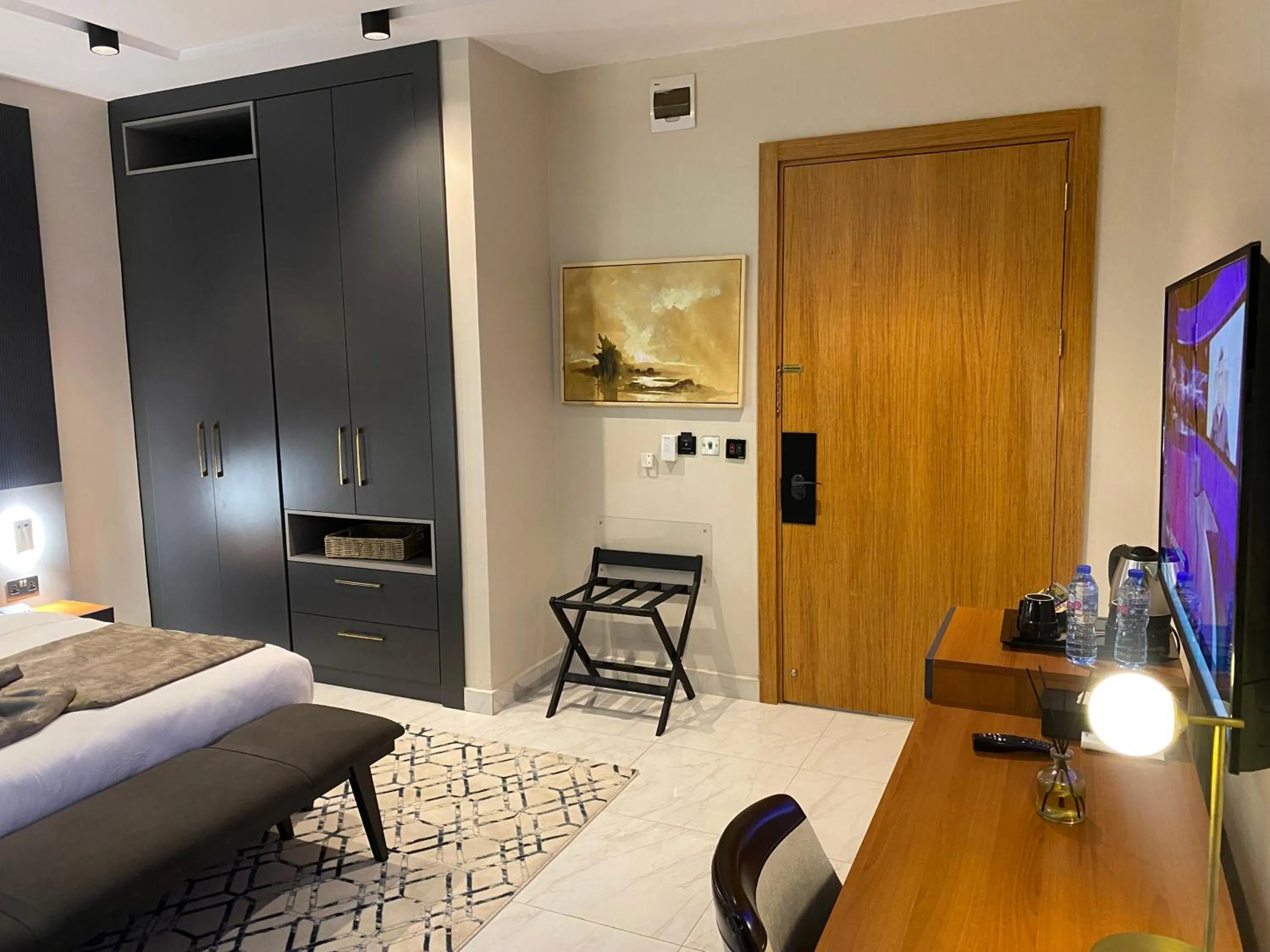 Bed in Wali's Suites