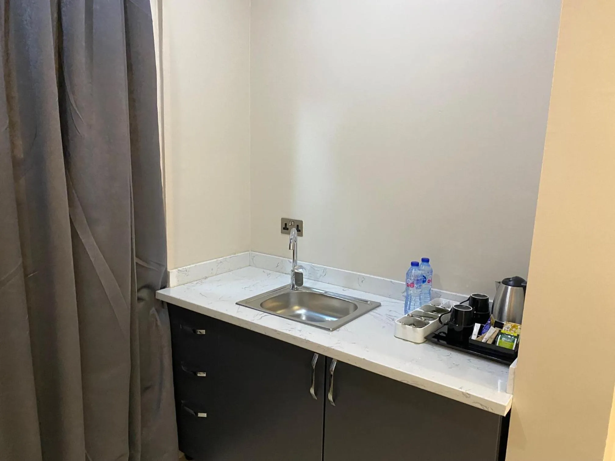 Kitchen or kitchenette in Wali's Suites