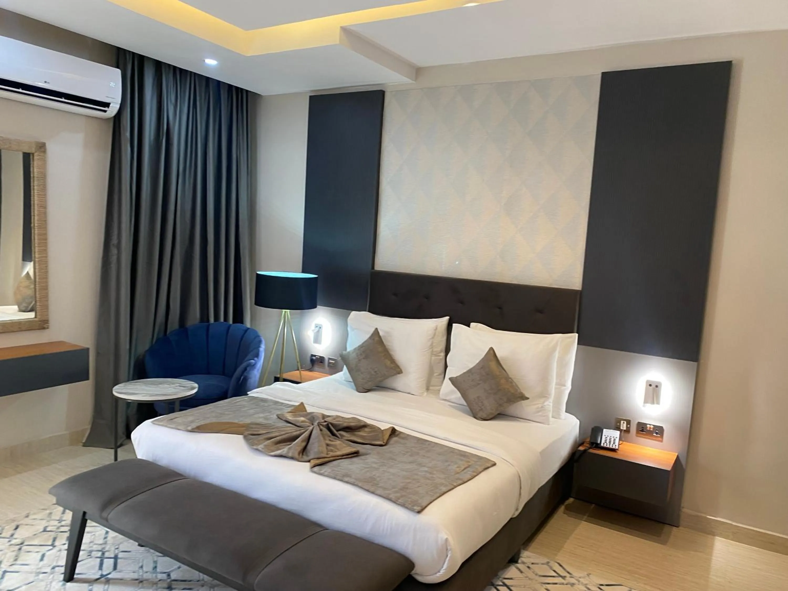 Bed in Wali's Suites