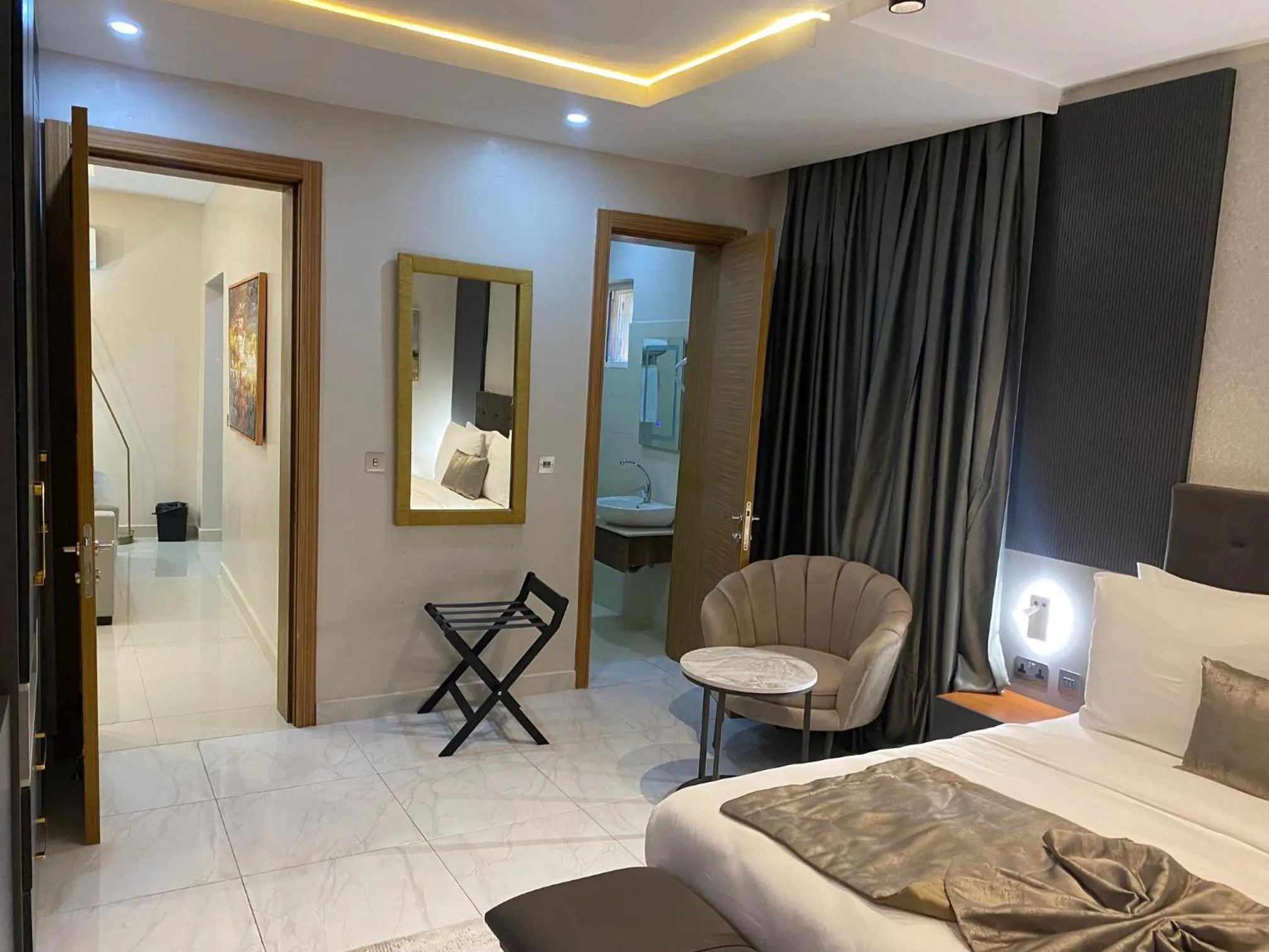 Bed in Wali's Suites