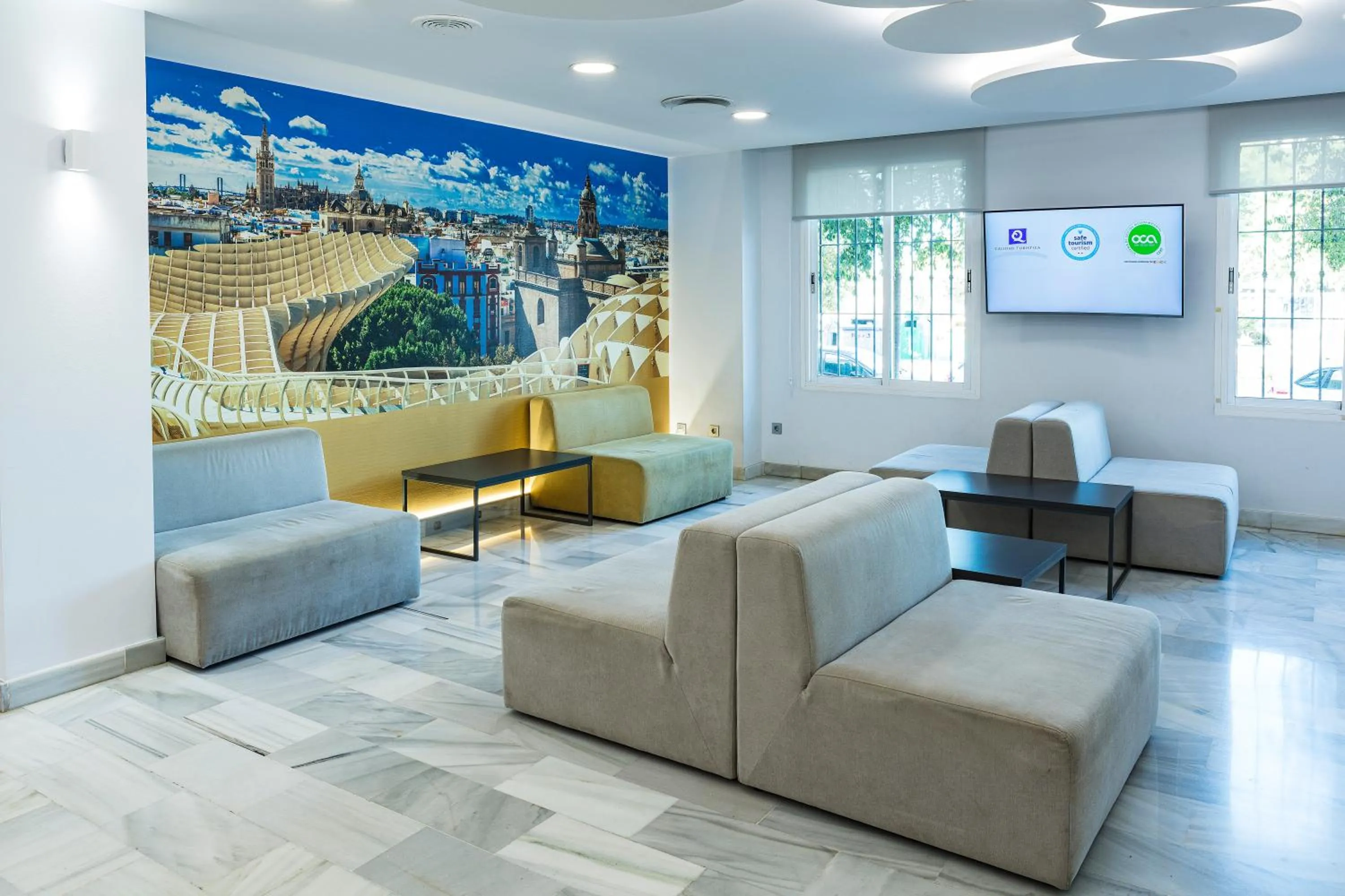 Communal lounge/ TV room in Bellavista Sevilla