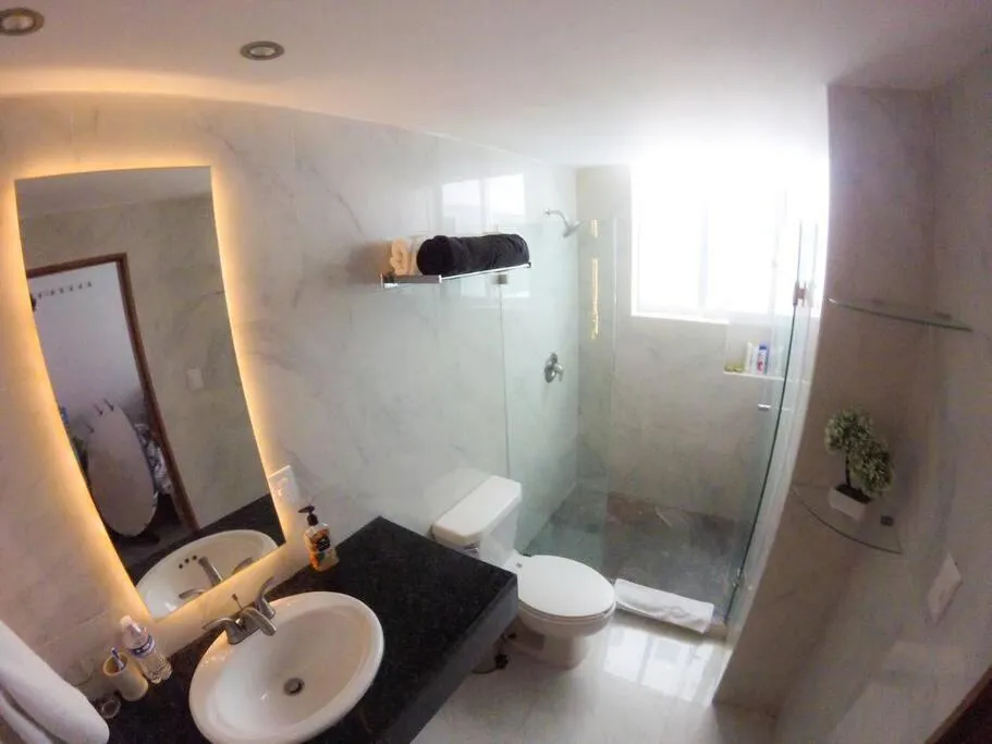 Shower in Estudio 4 sobre playa, alberca, gimnasio, jacuzzi