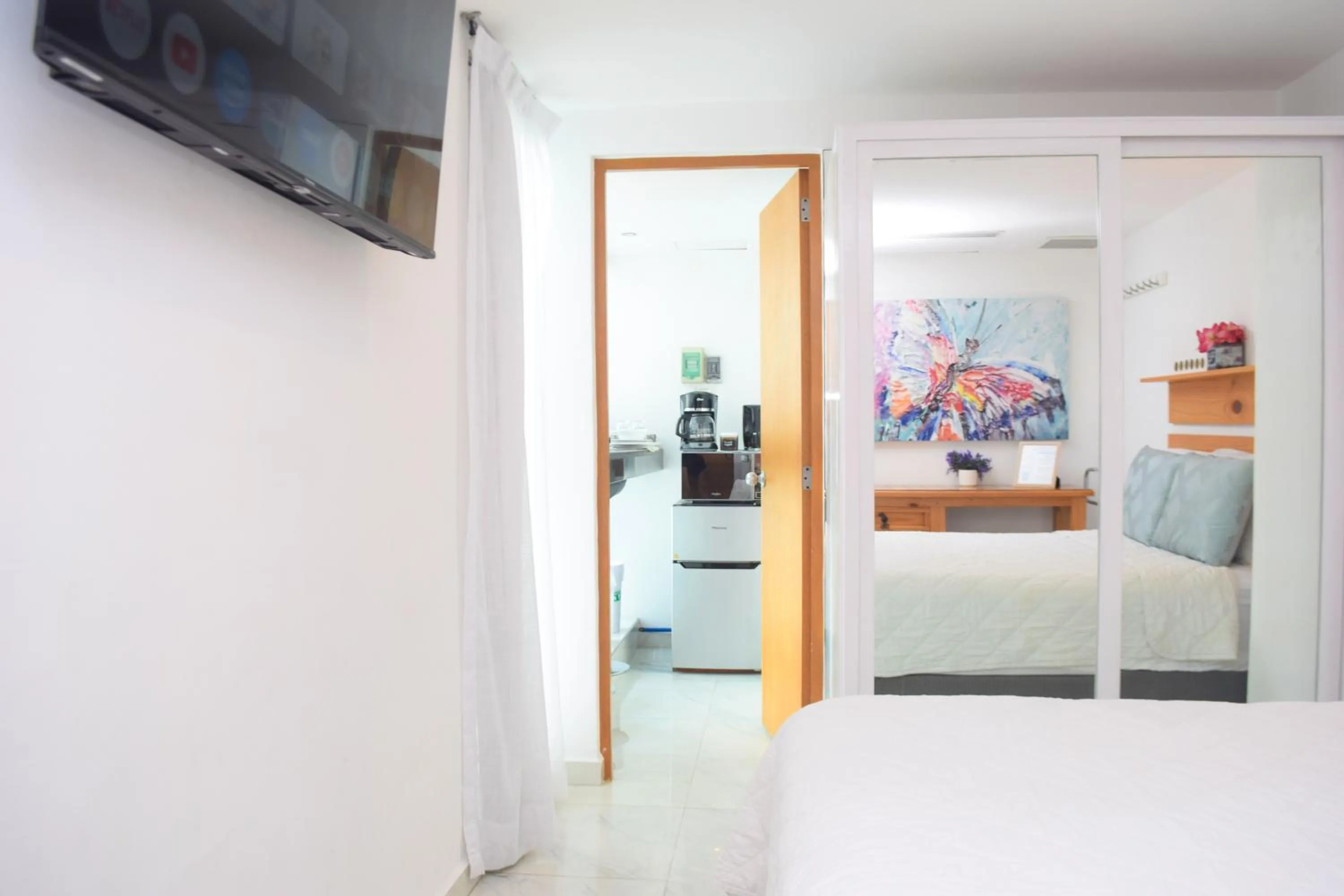 Bed in Estudio 4 sobre playa, alberca, gimnasio, jacuzzi