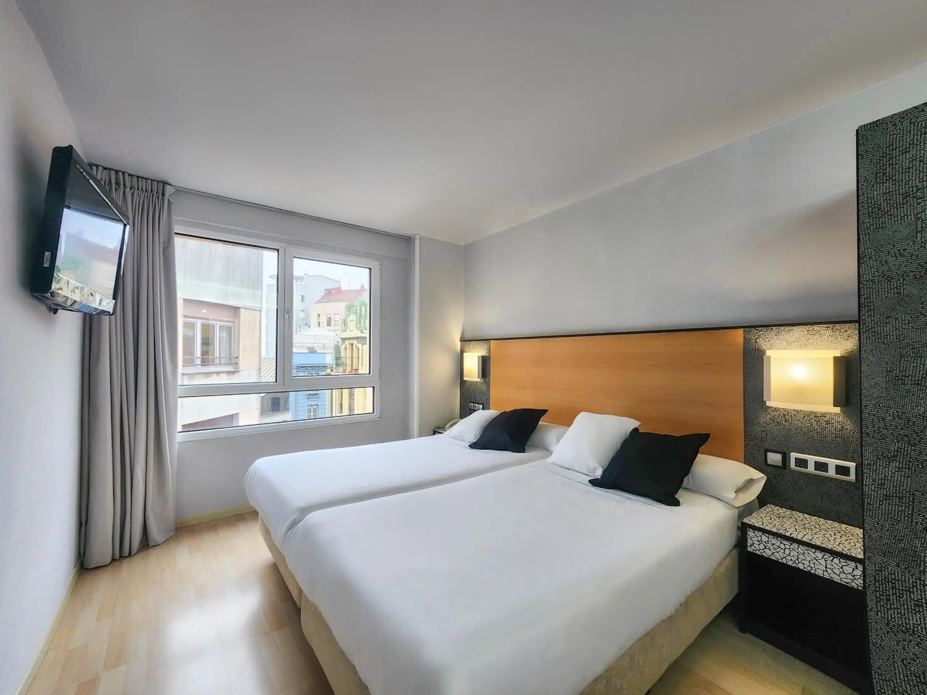 Bed in Hotel Faranda Pathos Gijón, Ascend Hotel Collection