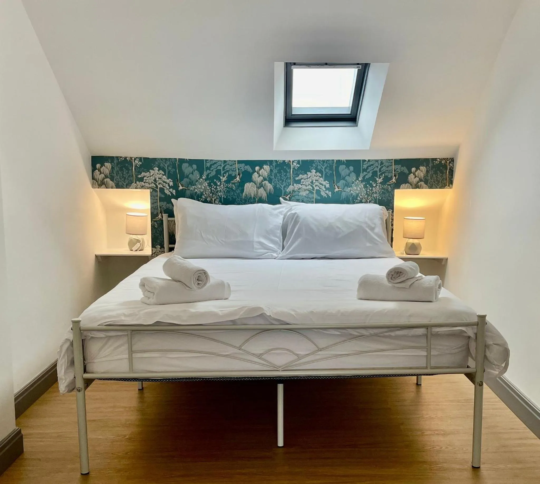 Bed in LilyRose Hotel