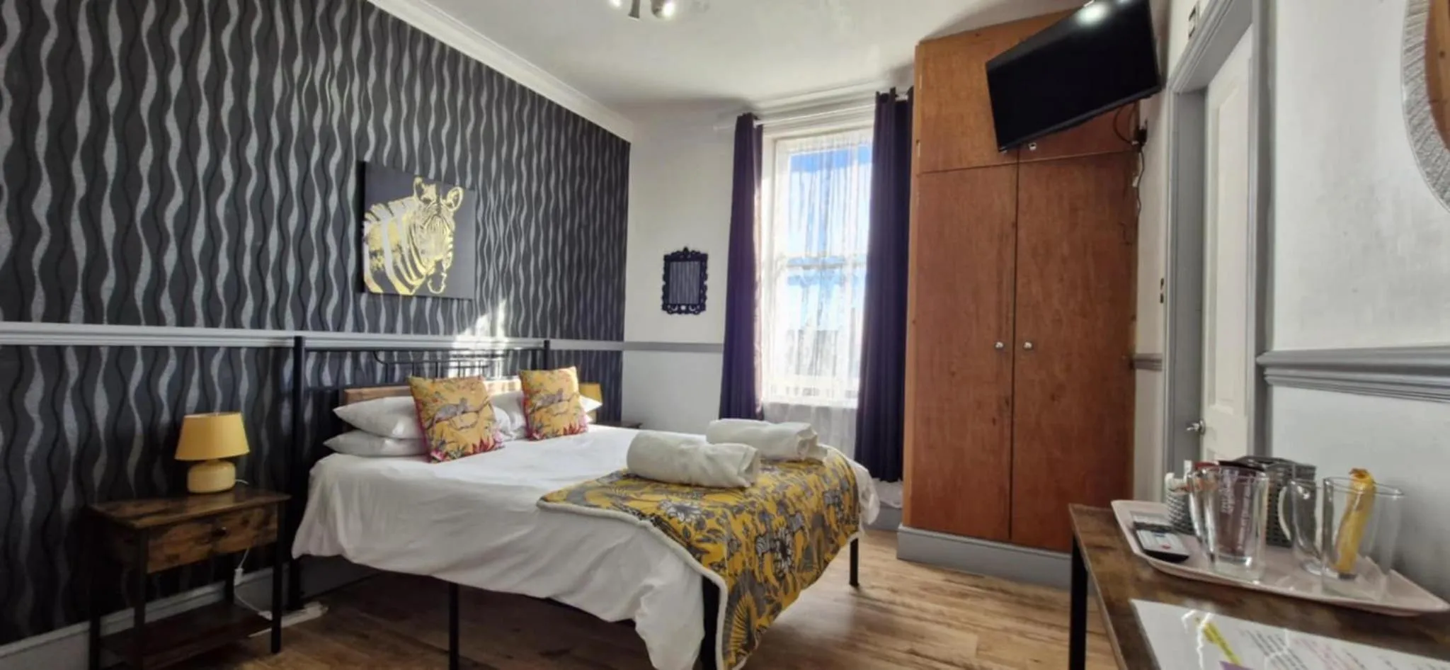 Bedroom, Bed in LilyRose Hotel