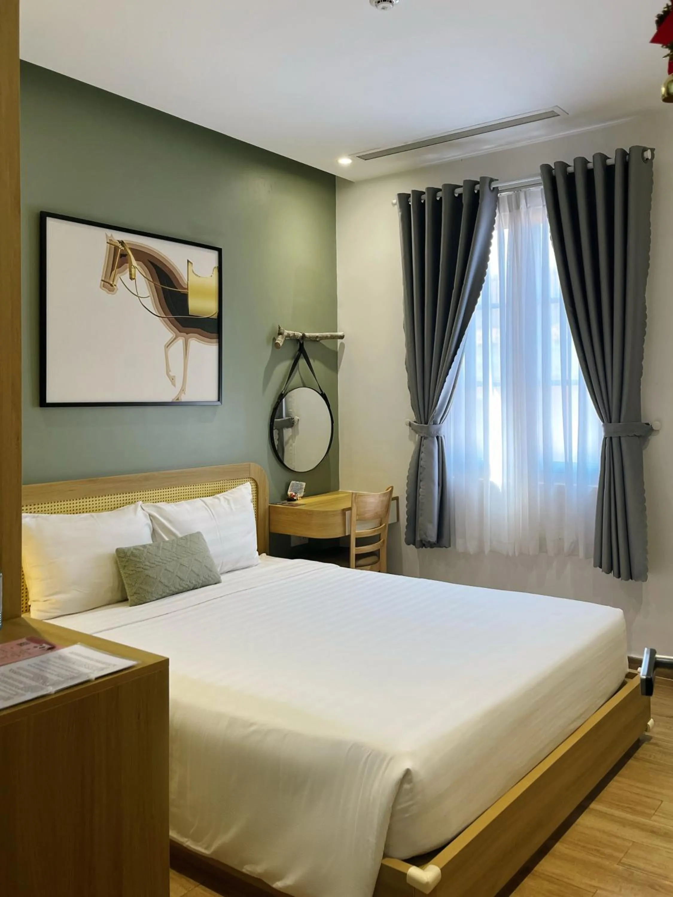 Bed in Triland Hotel