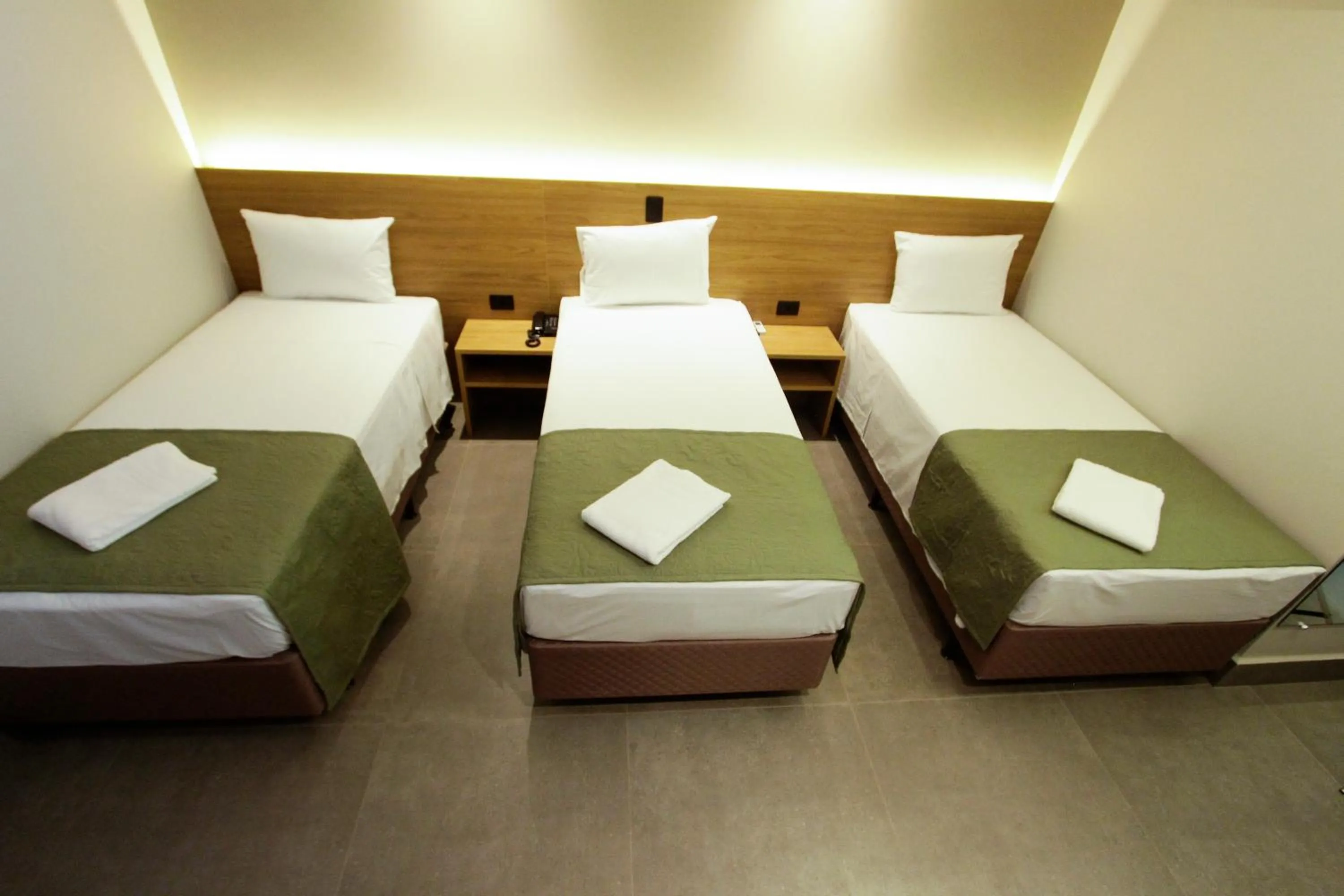 Bed in NEO PARK HOTEL