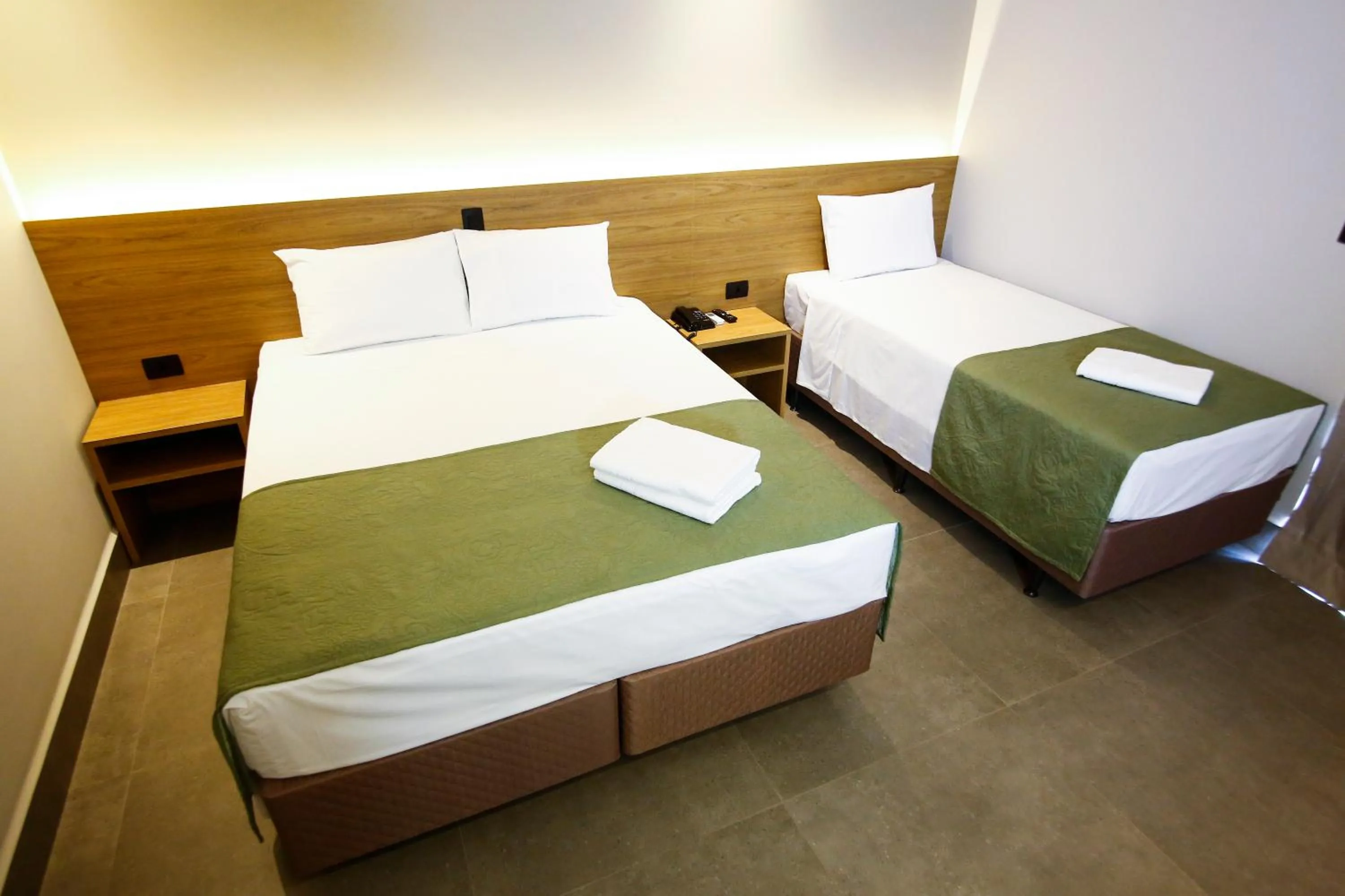 Bed in NEO PARK HOTEL