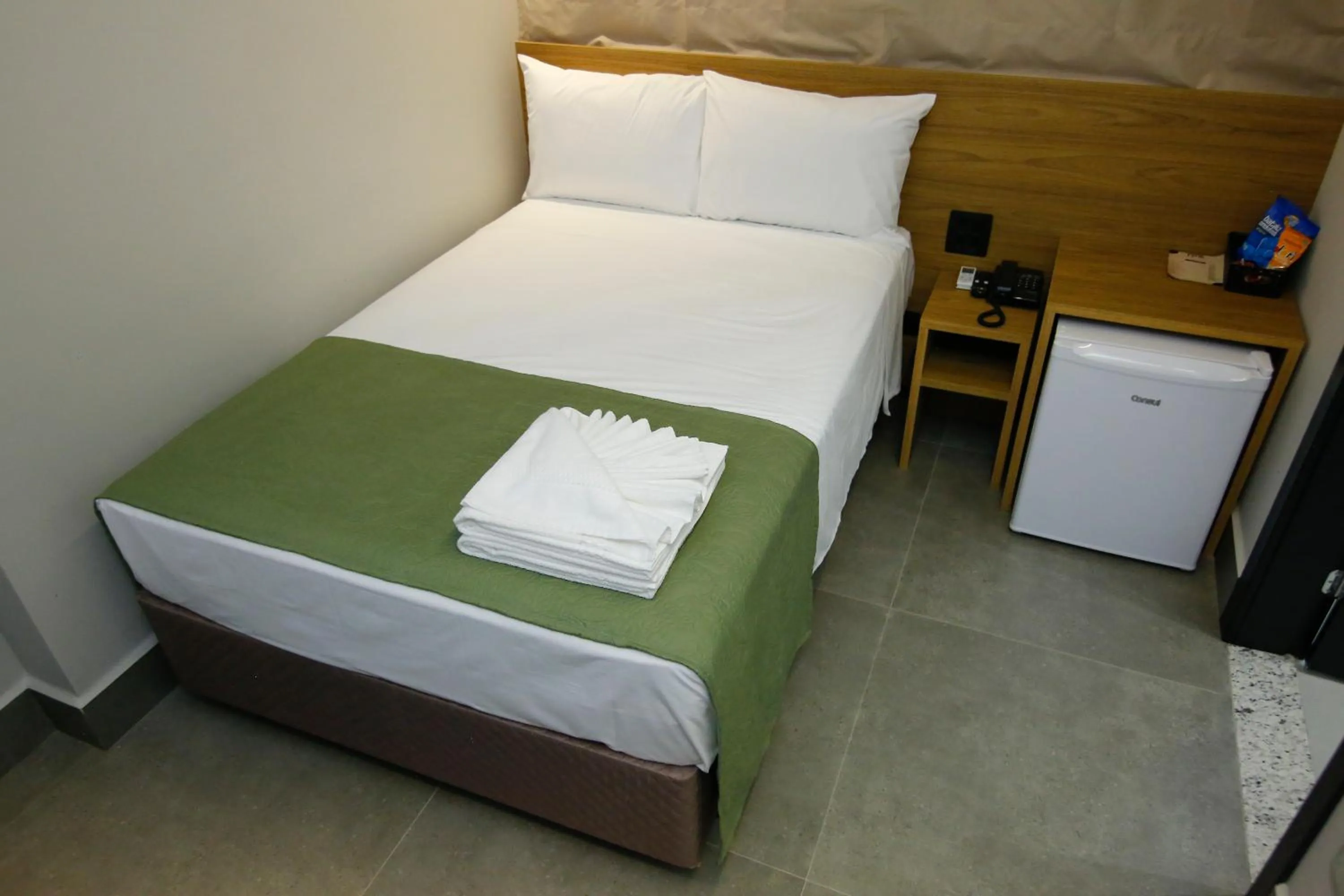 Bed in NEO PARK HOTEL