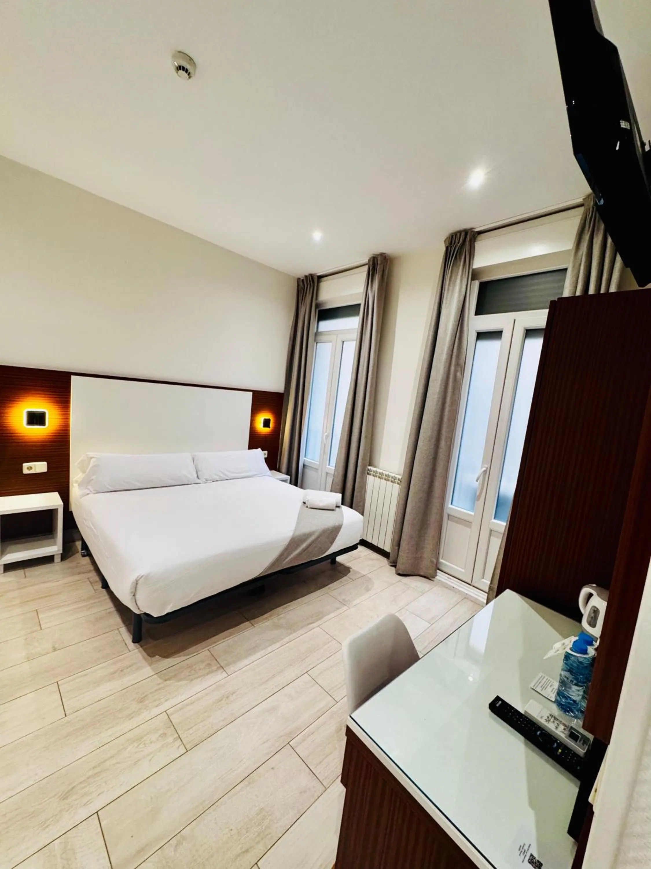 Bed in Hostal Cervelo