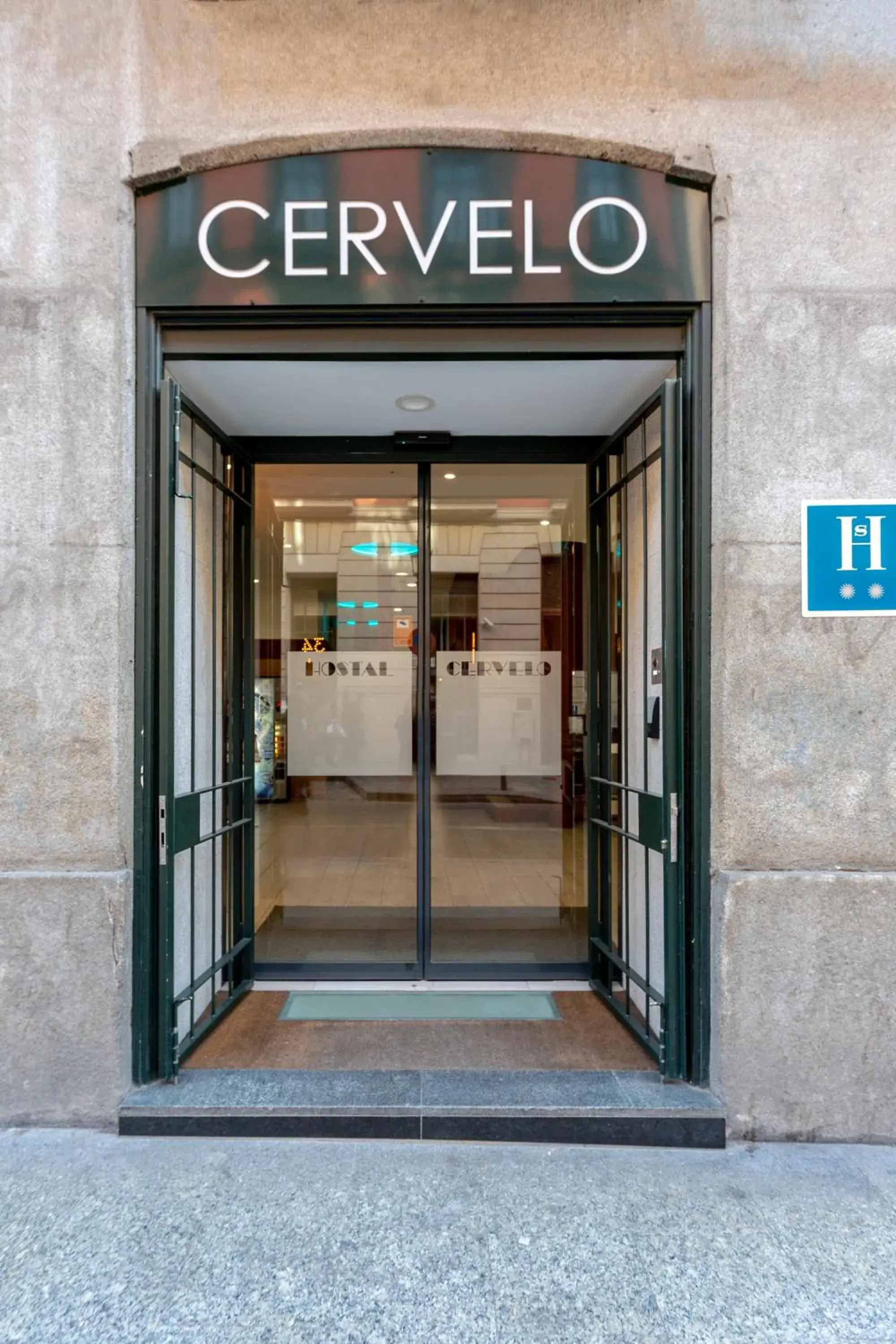 Facade/entrance in Hostal Cervelo Facade/entrance in Hostal Cervelo