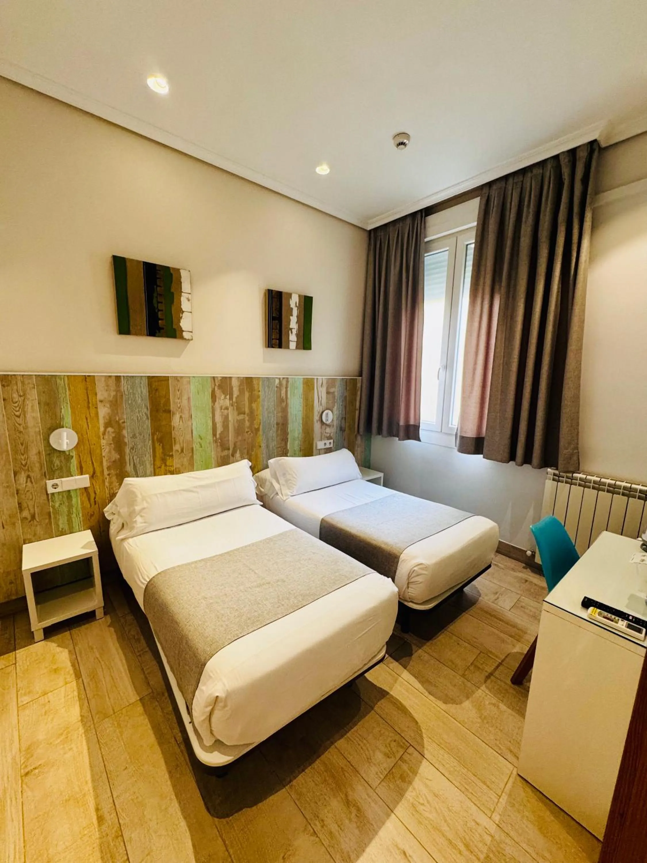 Bed in Hostal Cervelo