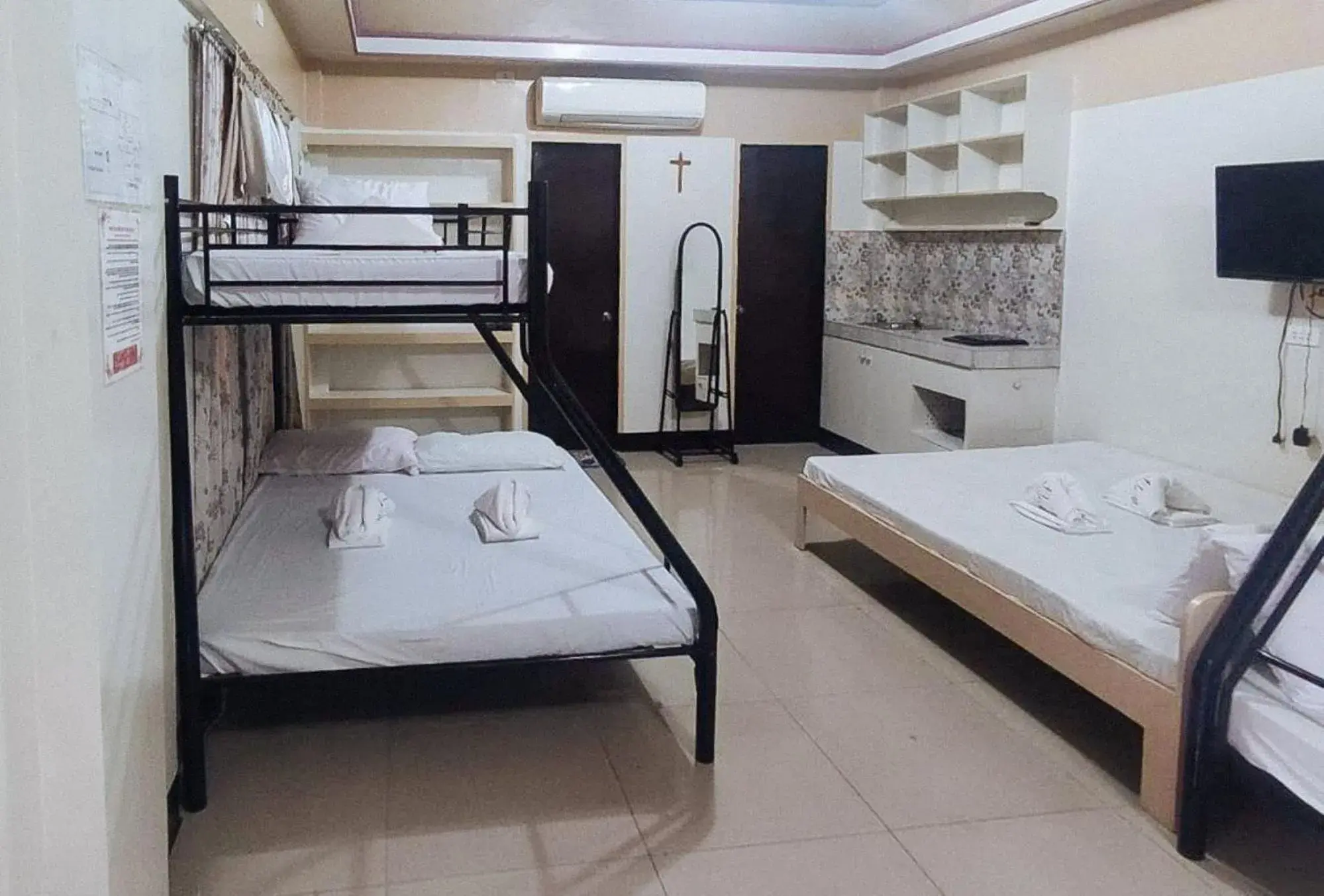 Bedroom, Bed in RedDoorz @ Isabelle Tourist Hotel Hinatuan Bedroom, Bed in RedDoorz @ Isabelle Tourist Hotel Hinatuan