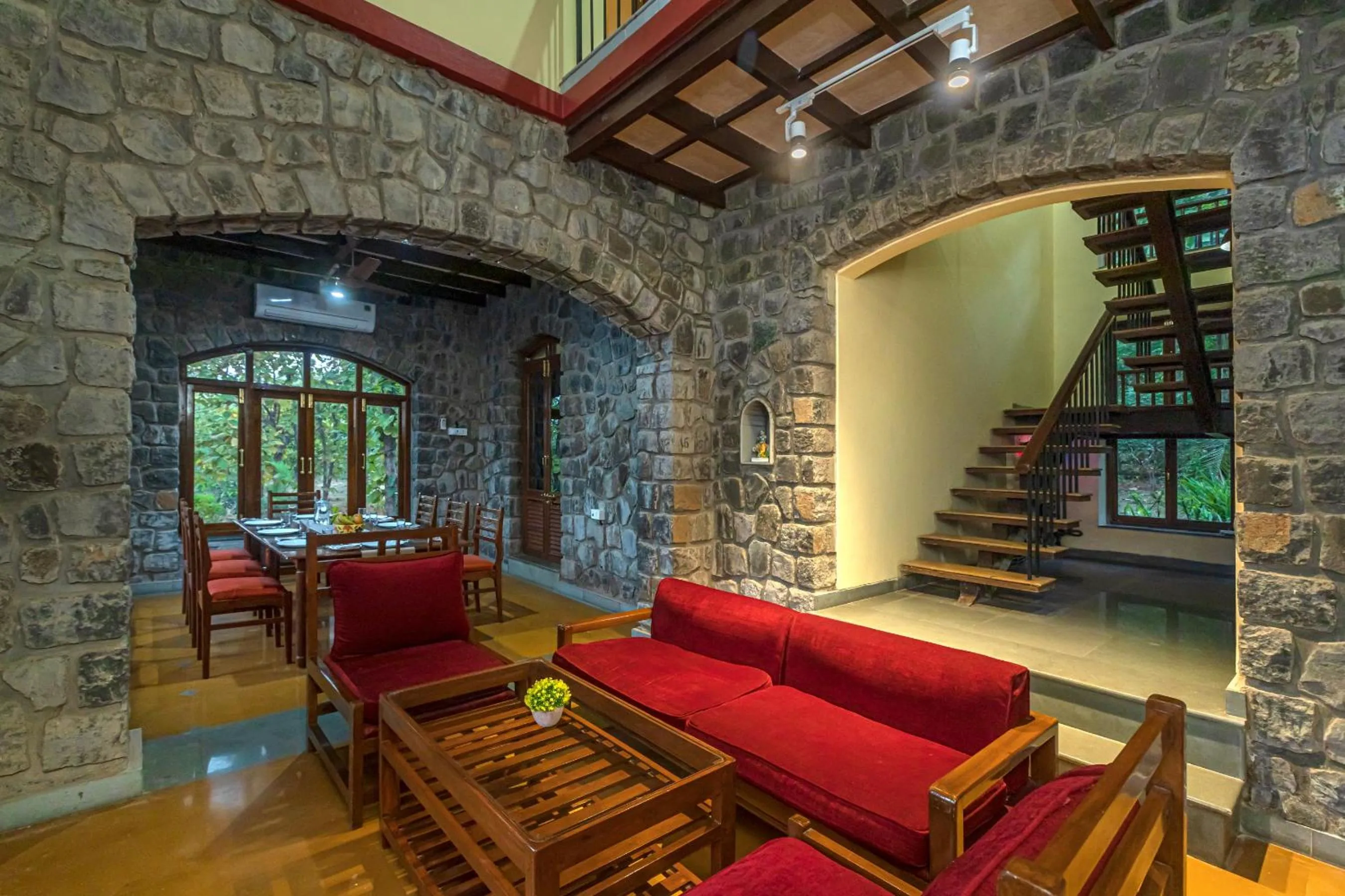 Living room in Saffronstays Alma Grove 3 BR Pet friendly with Pool & Nature View