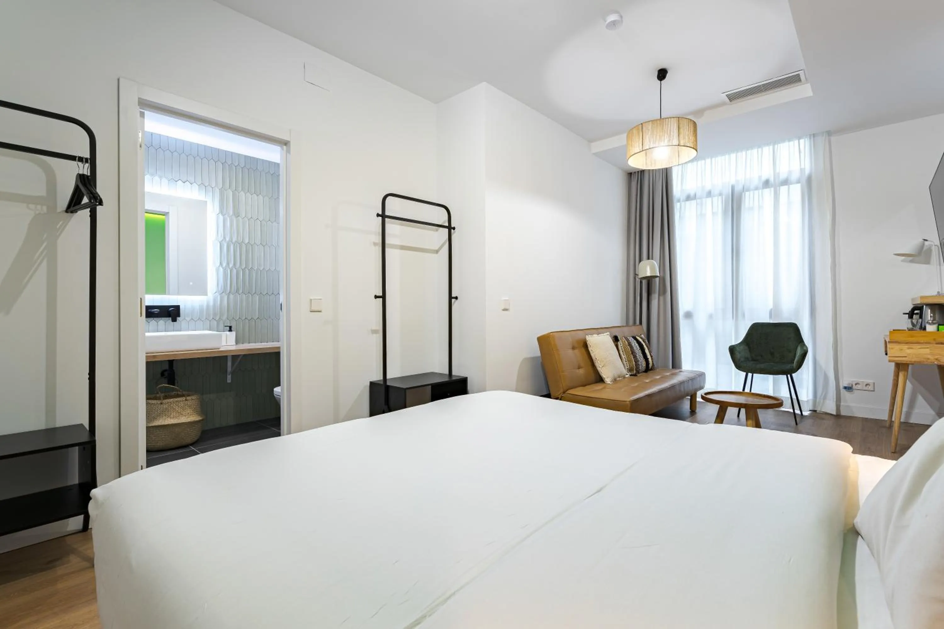 Photo of the whole room, Bed in Vallecas Suites by Olala Homes