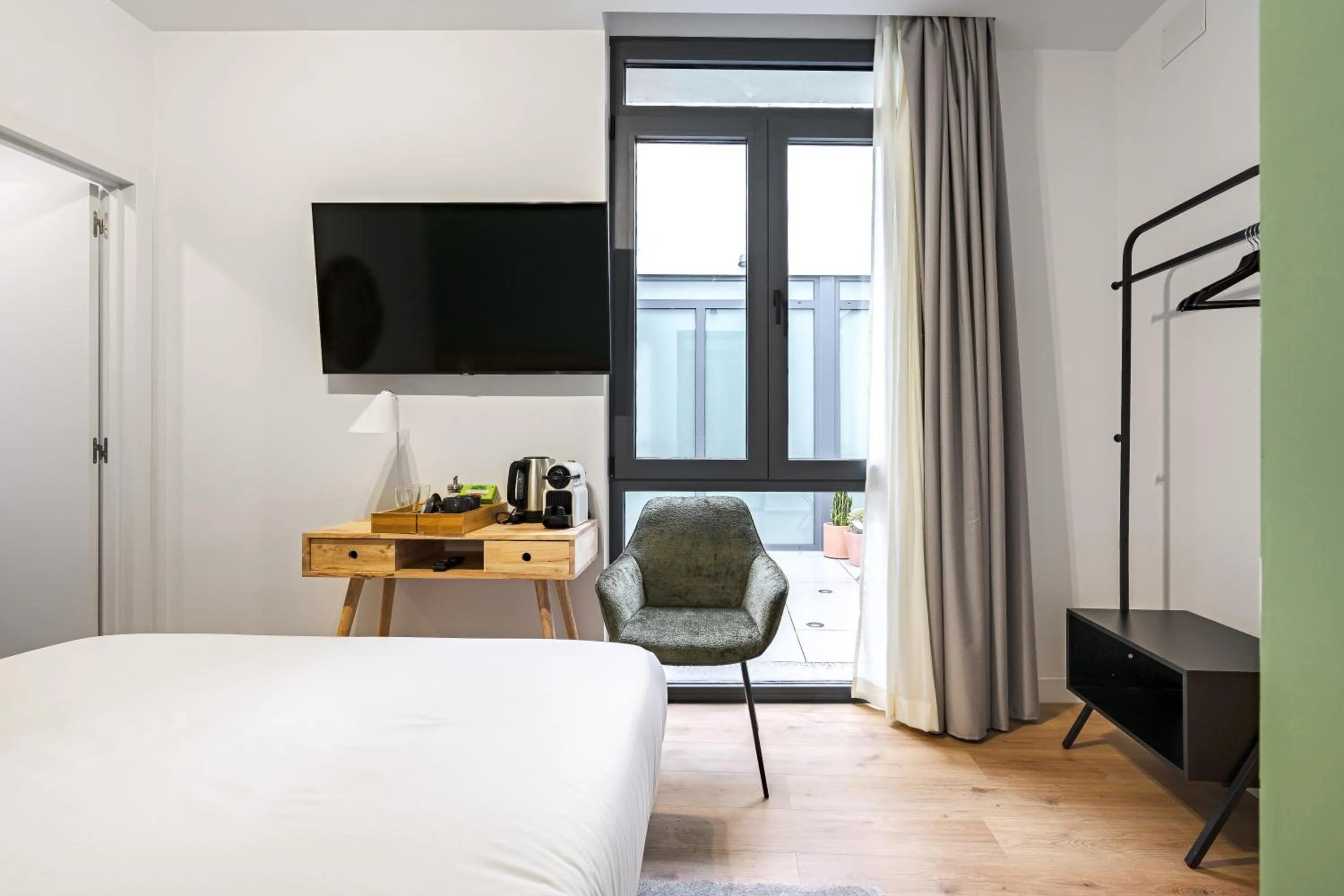 Photo of the whole room, Bed in Vallecas Suites by Olala Homes