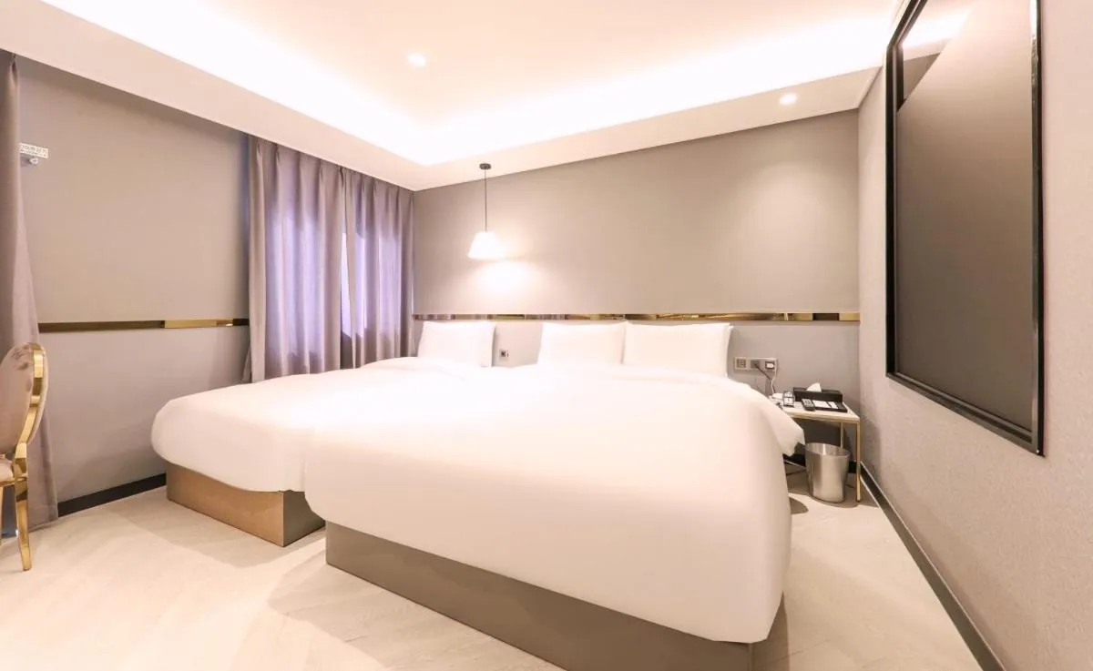 Bed in Brown Dot Hotel Yangsan Seochang